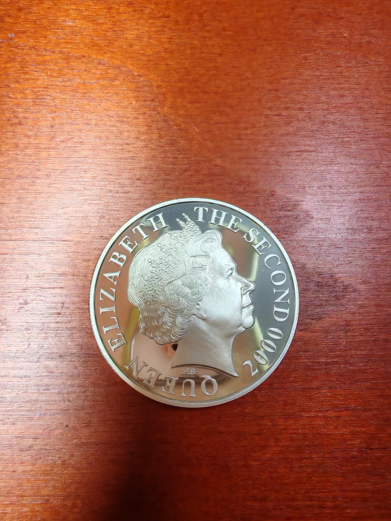 长老汇龙年精选第二十九场拍卖 1999泽西千禧年5镑部分镀金精制银币，地图币，3.2万枚，28.28克925银，镀金成色916.7金