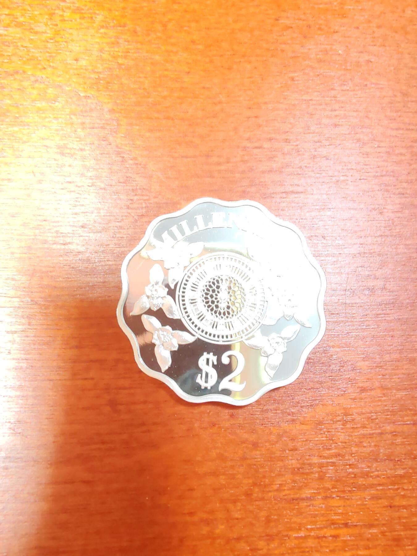 长老汇龙年精选第二十九场拍卖 1999开曼群岛千禧年2元梅花边精制银币，3万枚，1/2盎司999银