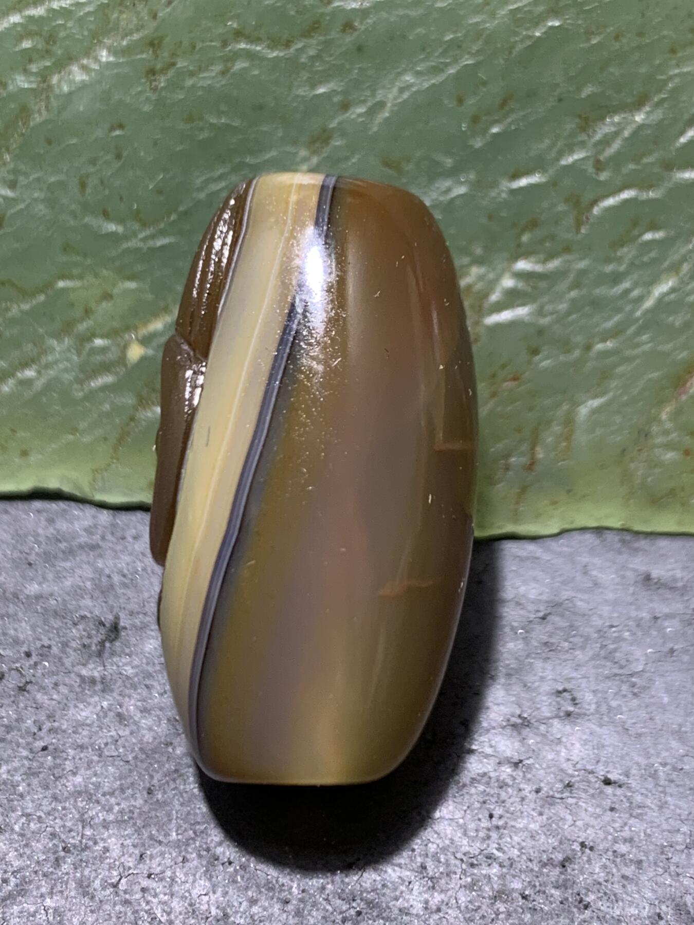 精美亚光高玉化巴西玛瑙手工俏色巧雕钱币元宝随形桶珠一个！