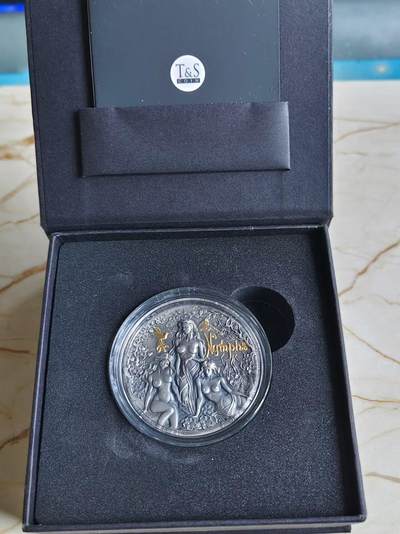第187期拍卖 - 【海寧潮】喀麦隆2024年希腊神话女神宁芙2盎司仿古镀金纪念银币，999银，发行量500枚