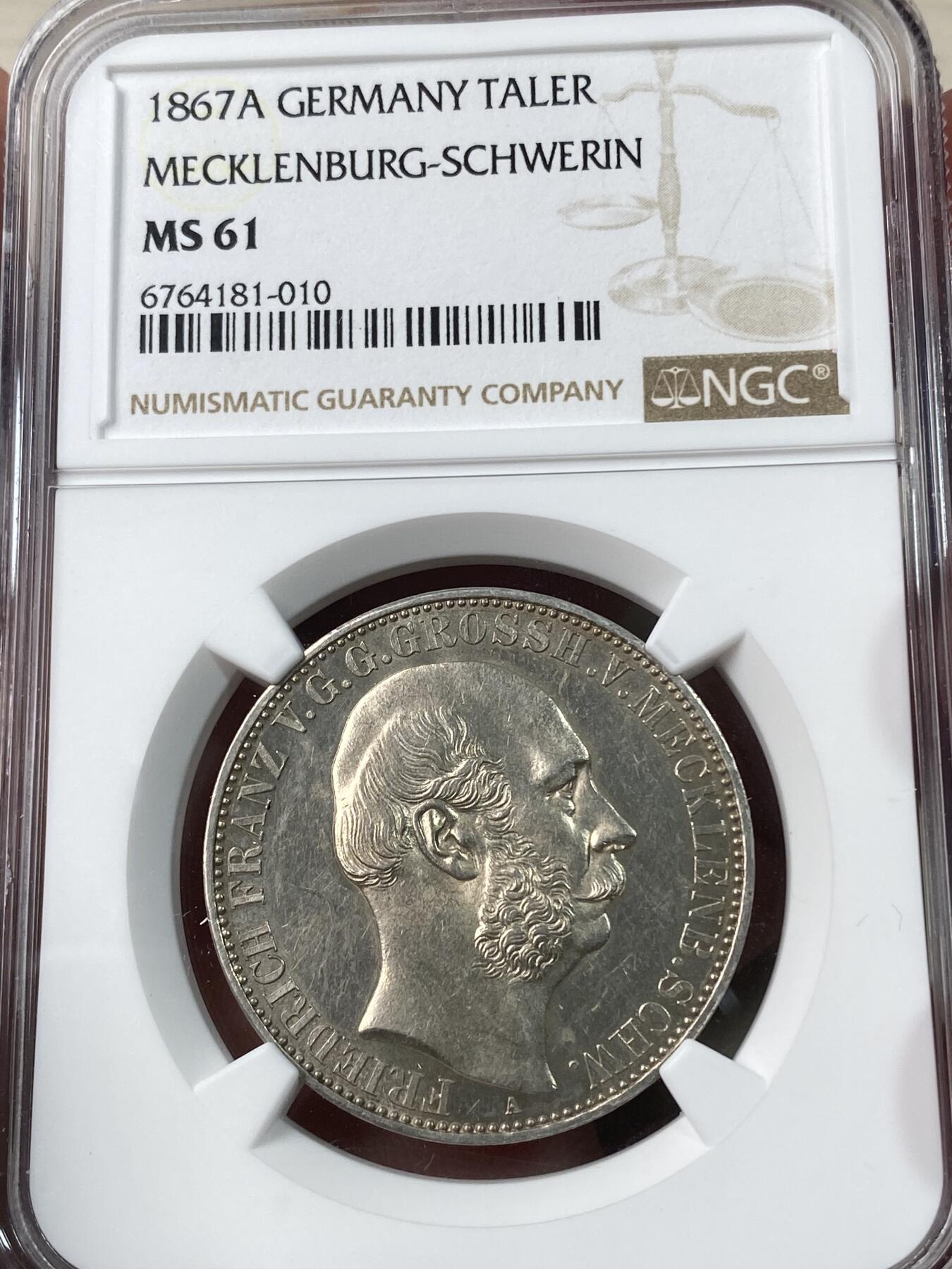 万国钱币拍卖第034期 NGC MS61 1867年德国梅克伦堡-什未林盾徽纪念流通1泰勒 转光牛头盾徽 小邦难度品种