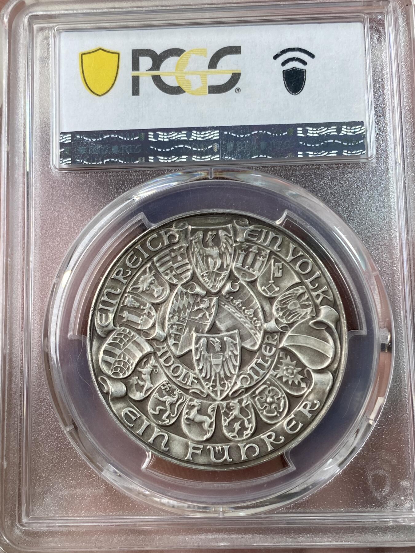 万国钱币拍卖第034期 PCGS SP64 1938年德国民族社会主义工人党纪念奥地利合并银章 两个德系民族正式双剑合璧 实现民族大一统 卡尔哥茨倾力设计
