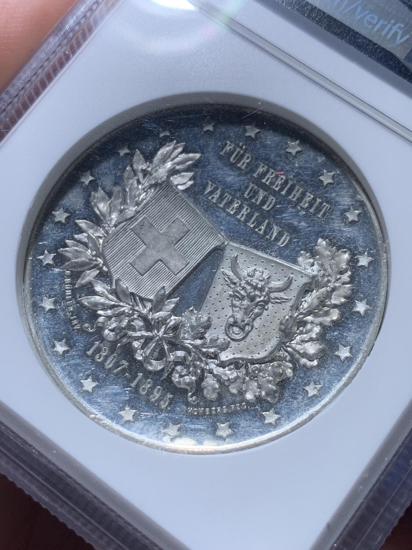 《竞宝斋》秋分专场 2-2 中拍送定制纪念章 周日，周一 （全场顺丰包邮）311场 NGC MS62 瑞士1895乌里射击节 白色金属章 高浮雕设计 NGC加厚盒 少见品种 包金属材质少见