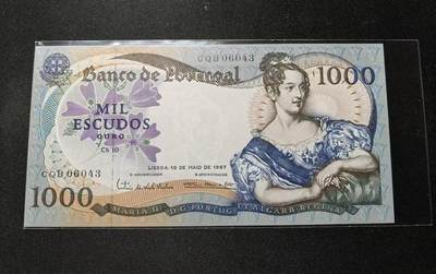 《外钞收藏家》第四百一十九期 - 葡萄牙1967年500埃斯库多 全新品相，左右侧边有针尖大小的荧光斑