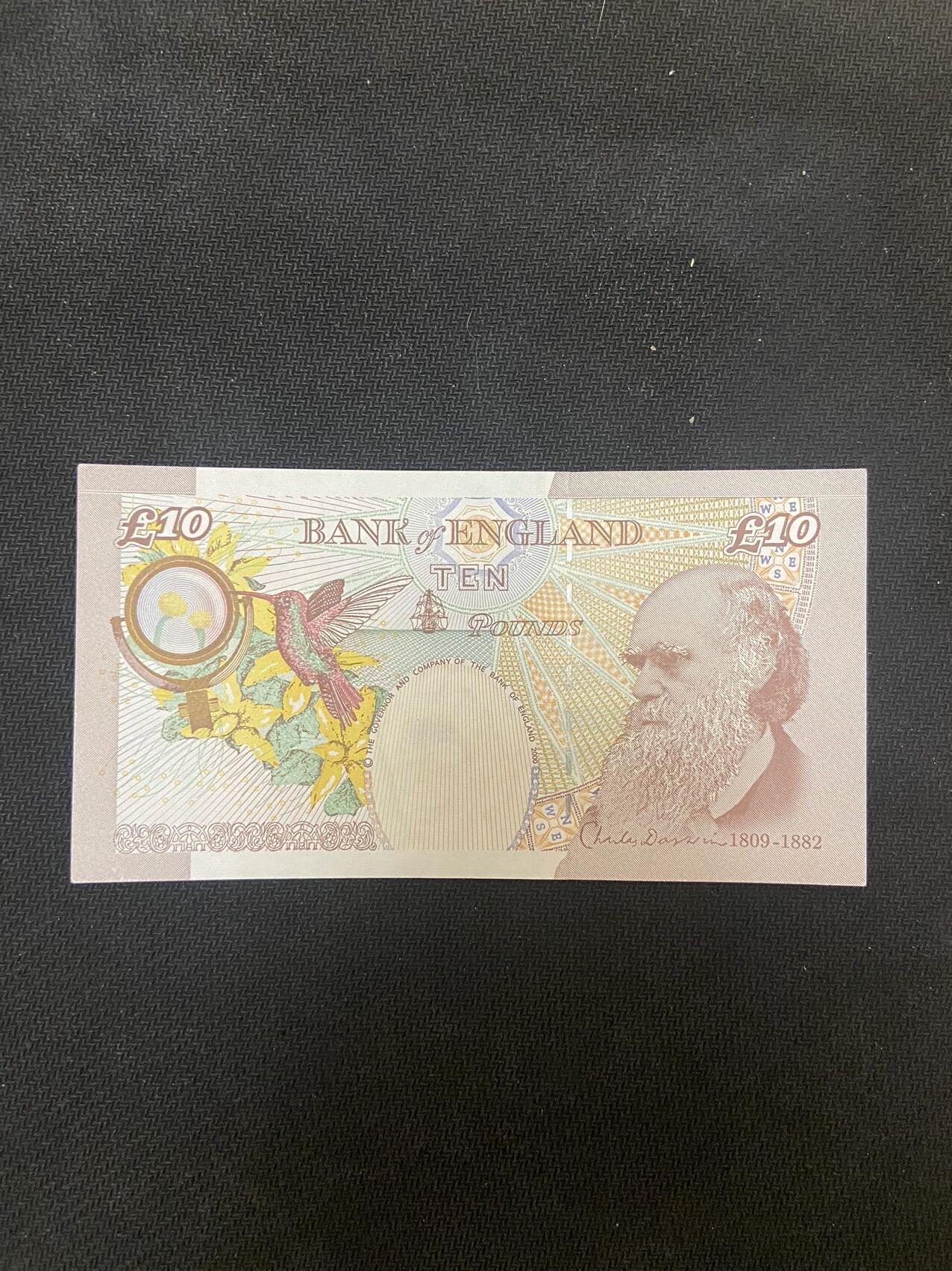 【炜奕收藏】，第十四期，裸钞专场 英国E序列再版10磅，UNC-品相，安全线处有磨损