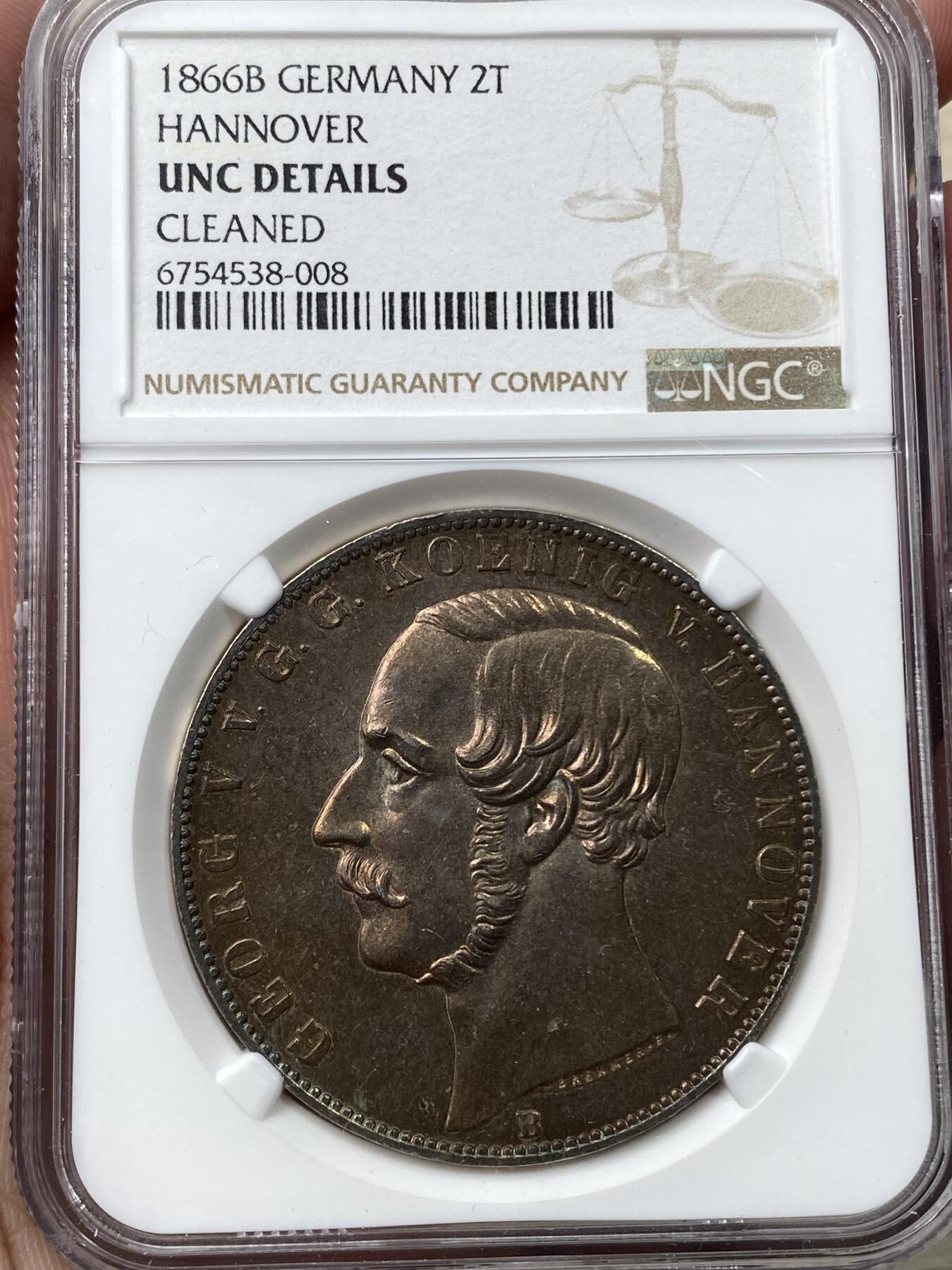 万国钱币拍卖第035期（金银流霞●万国秋季大拍） NGC UNCD 1866年德国汉诺威乔治五世狮马2泰勒 如此均匀的金红色包浆实属难得，高点也有着相当良好的表现。