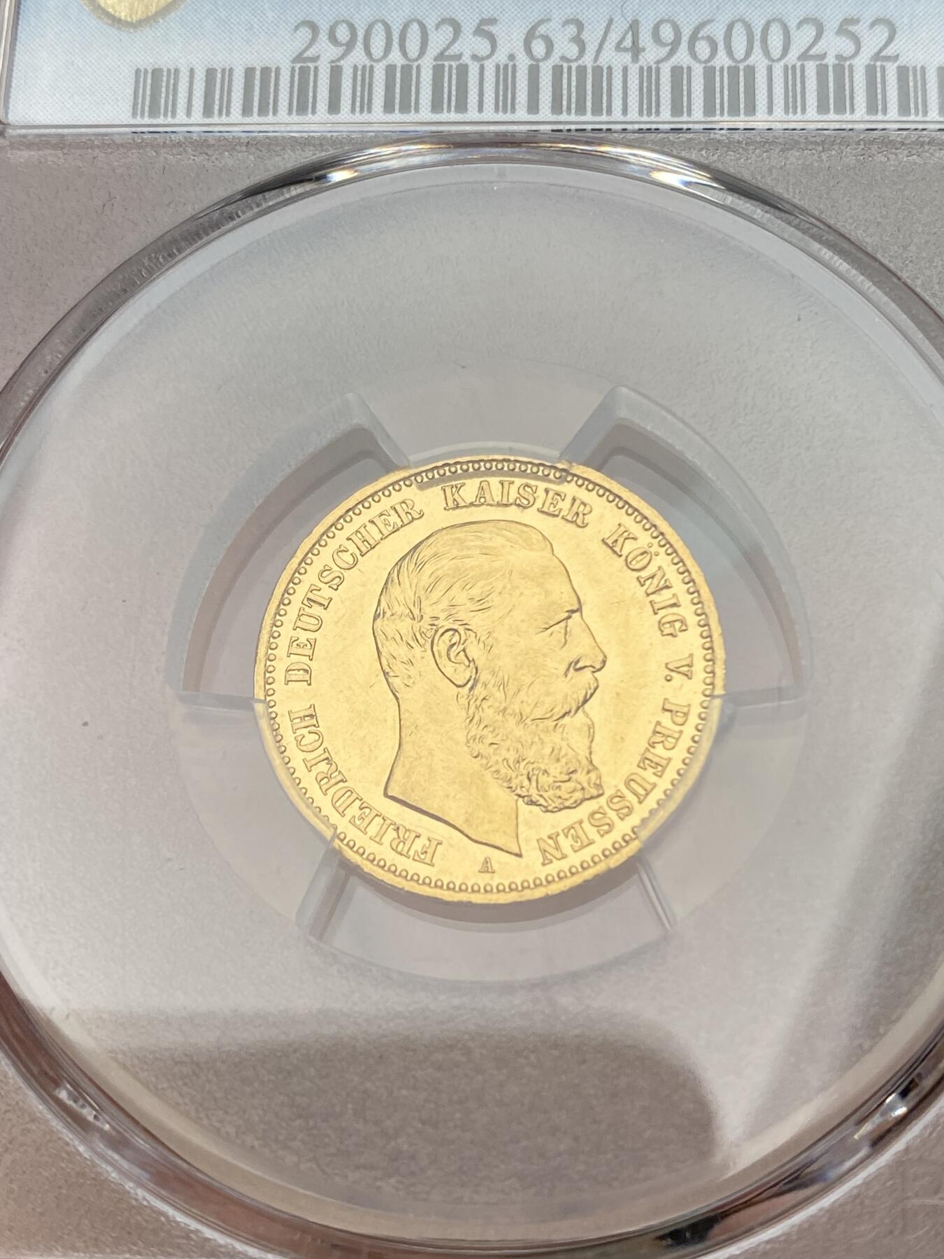 万国钱币拍卖第035期（金银流霞●万国秋季大拍） PCGS PR63 1888年德国普鲁士三皇之年腓特烈三世10马克金币 非常罕见的精制短翅金币，与普制完全不同的状态，镜面感极强，PCGS冠军分&封面广告币，3.98g 900金。