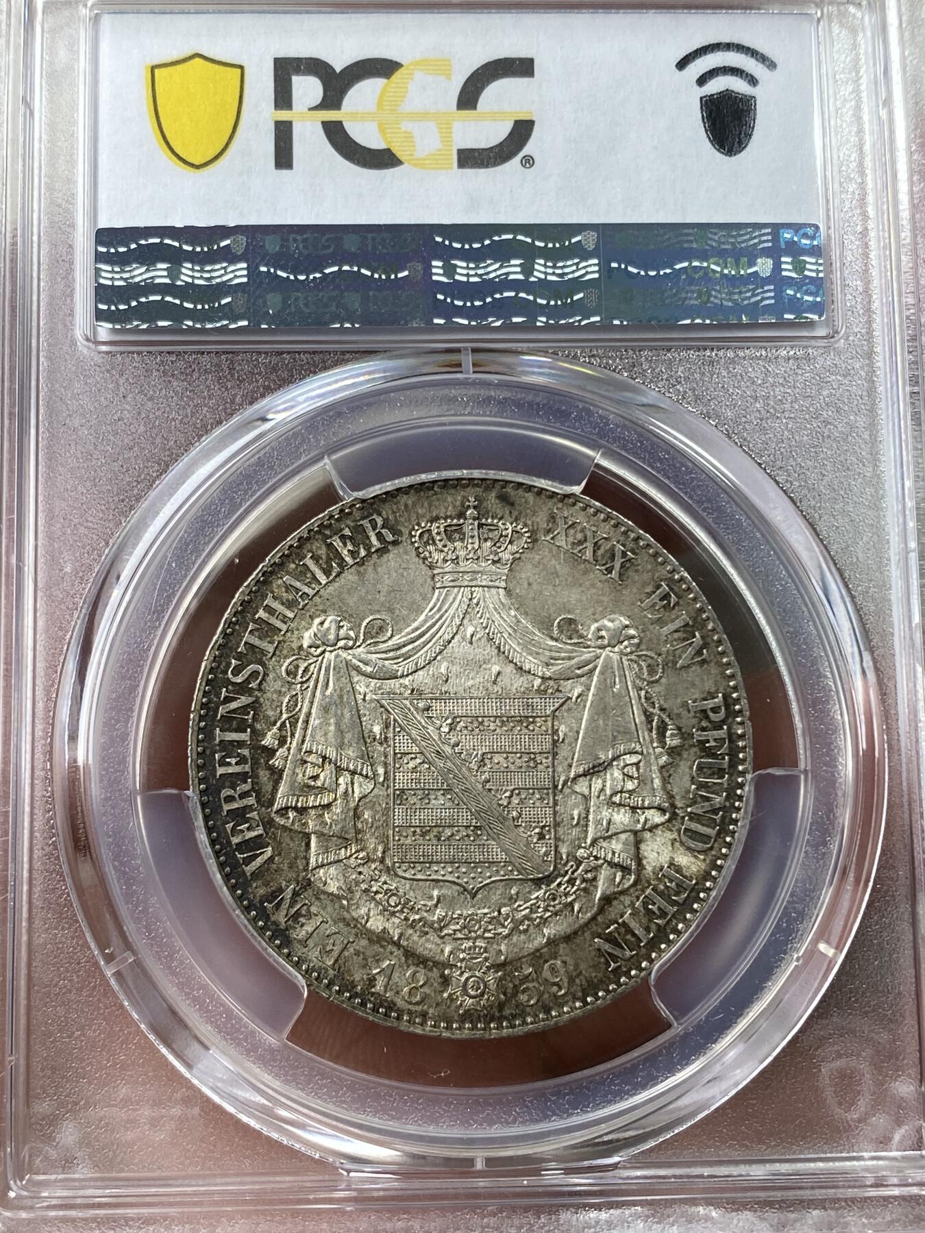 万国钱币拍卖第035期（金银流霞●万国秋季大拍） PCGS MS64 1859年德国萨克森-梅宁根大窗帘盾徽流通1泰勒 小邦中的极难品种，原味深打，五彩转光，PC冠军分。