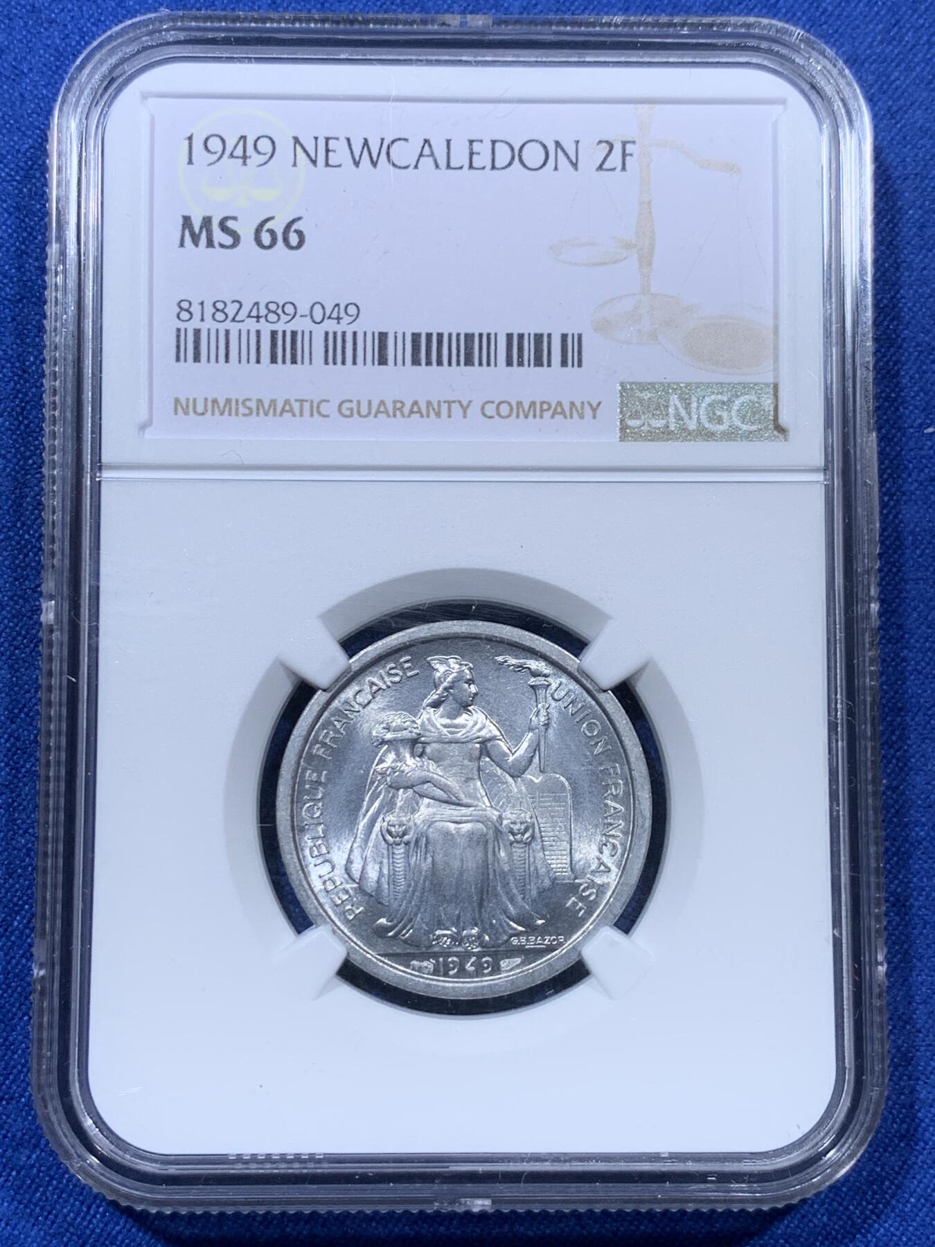 《竞宝斋》第313场 周日，周一 2场连拍 （全场包邮） NGC MS66 亚军分！卷拆曝光 1949法属新喀里多尼亚 2法郎 少见品种 细节极好 转光犀利 可遇不可求的分数