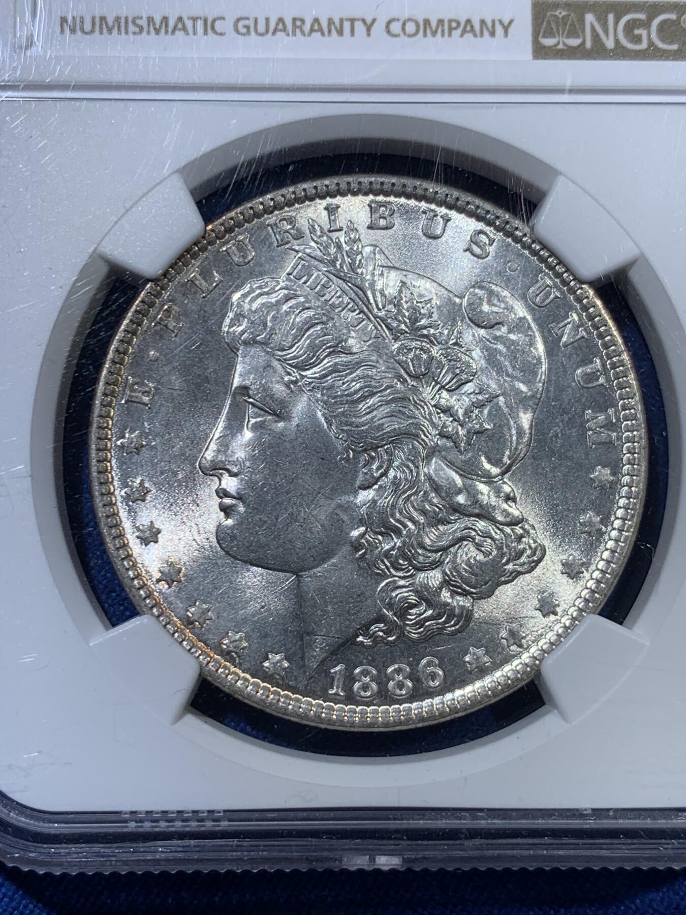 《竞宝斋》第313场 周日，周一 2场连拍 （全场包邮） NGC MS64 美国 1886年 1美元摩根银币 洁净度和光度是同分数很难遇到的