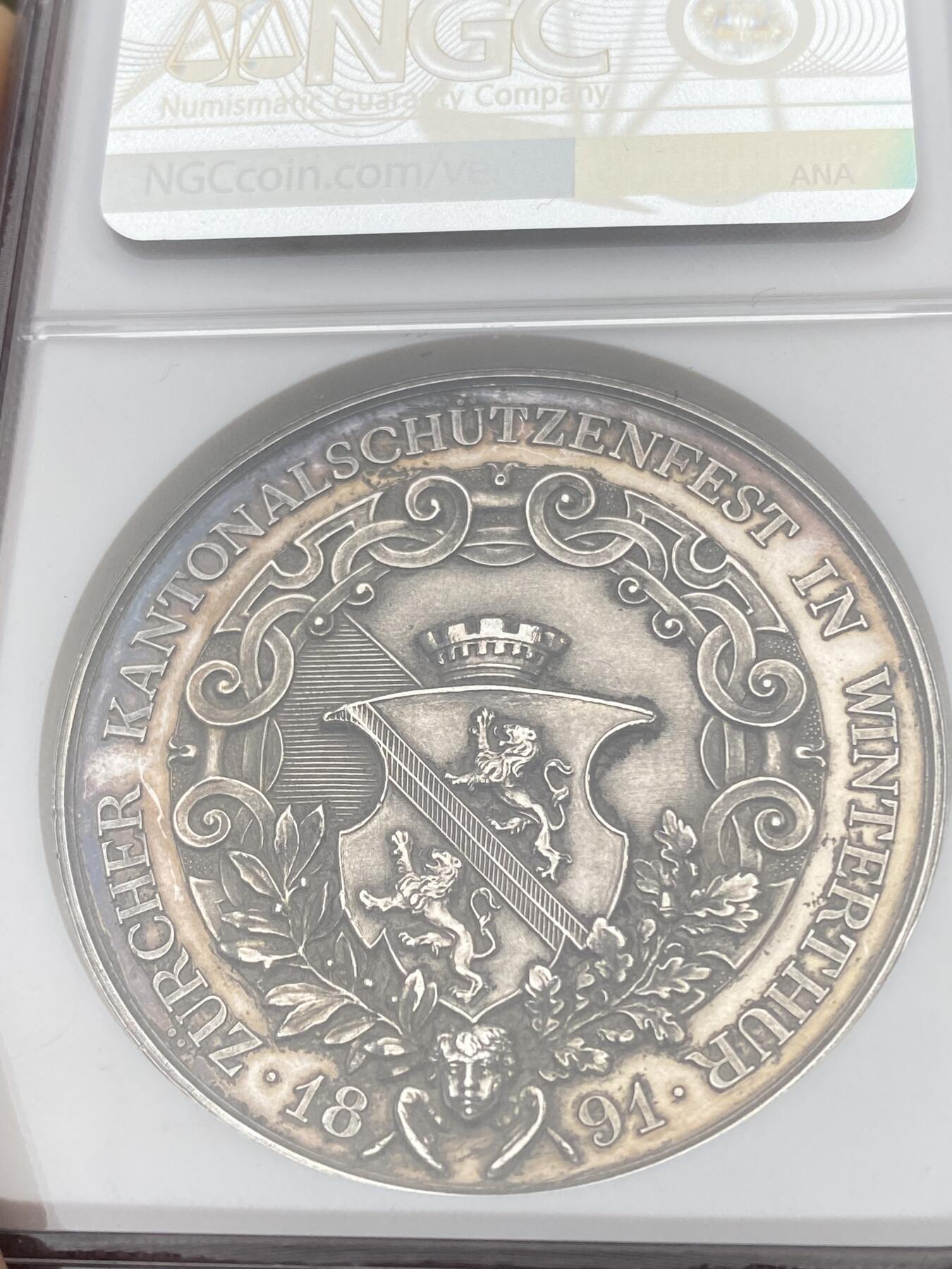 万国钱币拍卖第035期（金银流霞●万国秋季大拍） NGC UNCD 1891年瑞士苏黎世联邦射击节大银章 大规格高浮雕厚重品种 无论高点亦或底板都表现不俗