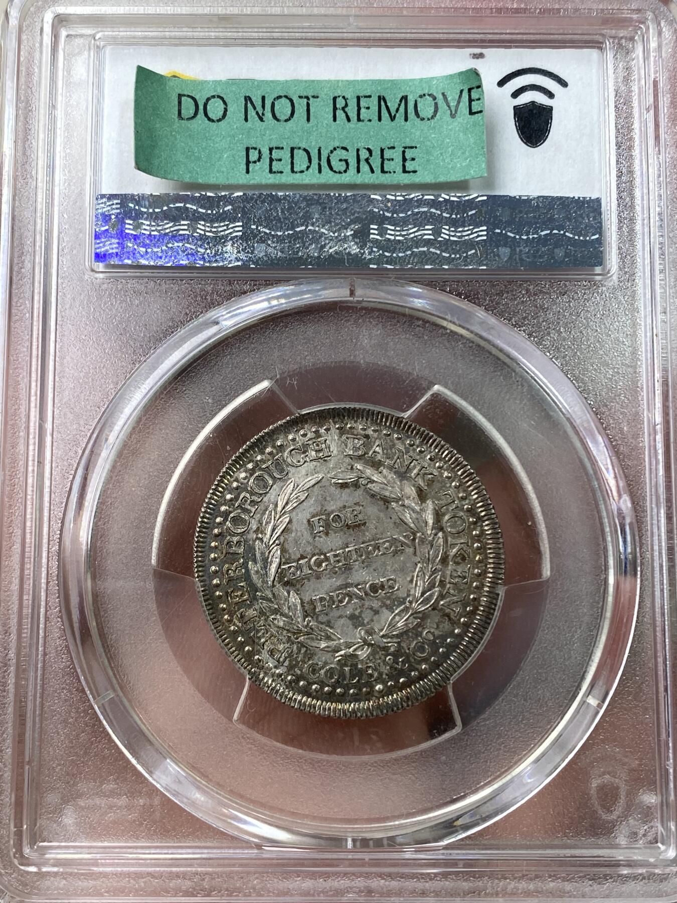 万国钱币拍卖第035期（金银流霞●万国秋季大拍） PCGS MS63 1811年英国北安普敦郡彼得堡银行18便士银质代用币 正面彼得伯勒银行景观 孔雀蓝环彩异常精美