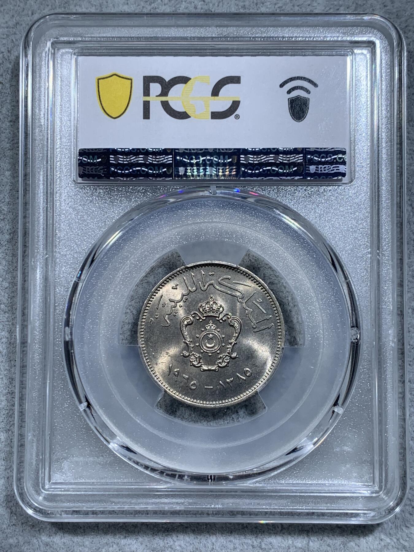 《竞宝斋》第314场 周日，周一，周二  3场连拍 （全场包邮） PCGS MS66 唯一冠军分！AH1385-1965 利比亚20米利姆 这枚好品极少见 66分更是可遇不可求 两面爆光 细节极为清晰 国徽极为漂亮 细节见图