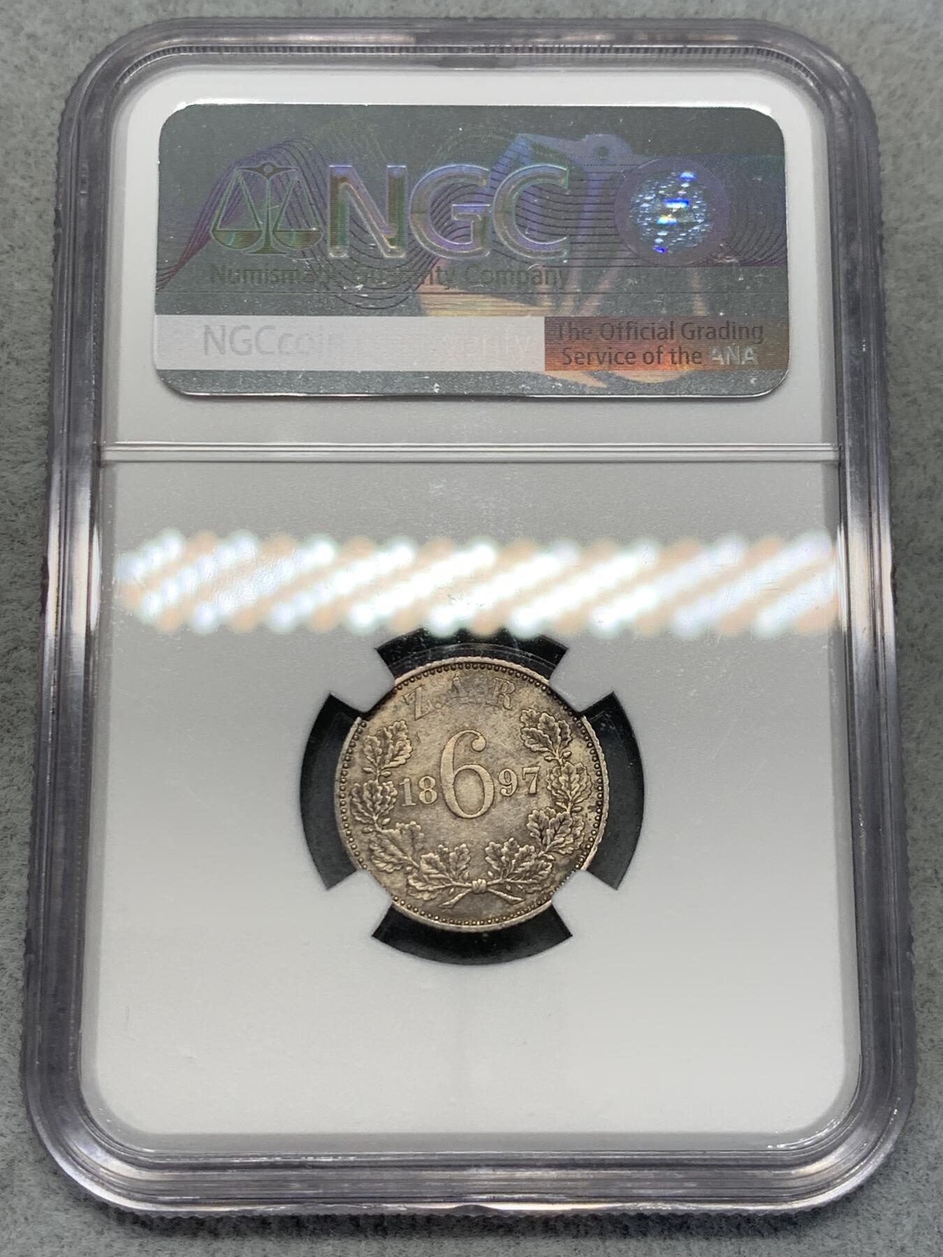 《竞宝斋》第314场 周日，周一，周二  3场连拍 （全场包邮） NGC AU58 德兰士瓦1897年6便士银币，布尔人于南非建立的白人共和国，英布战争前夕铸造，发行仅数个年份。所见多通货，高分少见。凑套必备