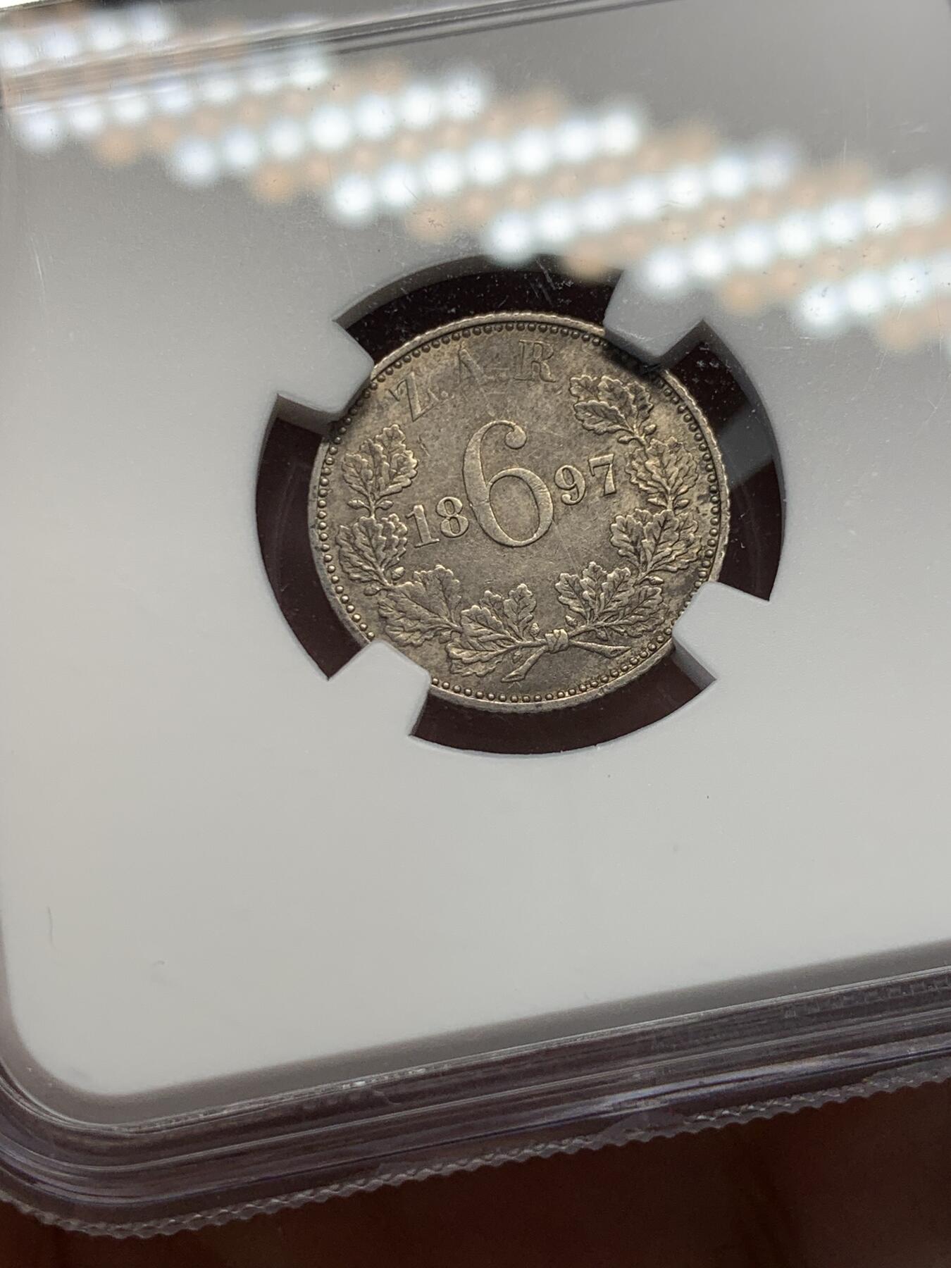 《竞宝斋》第314场 周日，周一，周二  3场连拍 （全场包邮） NGC AU58 德兰士瓦1897年6便士银币，布尔人于南非建立的白人共和国，英布战争前夕铸造，发行仅数个年份。所见多通货，高分少见。凑套必备