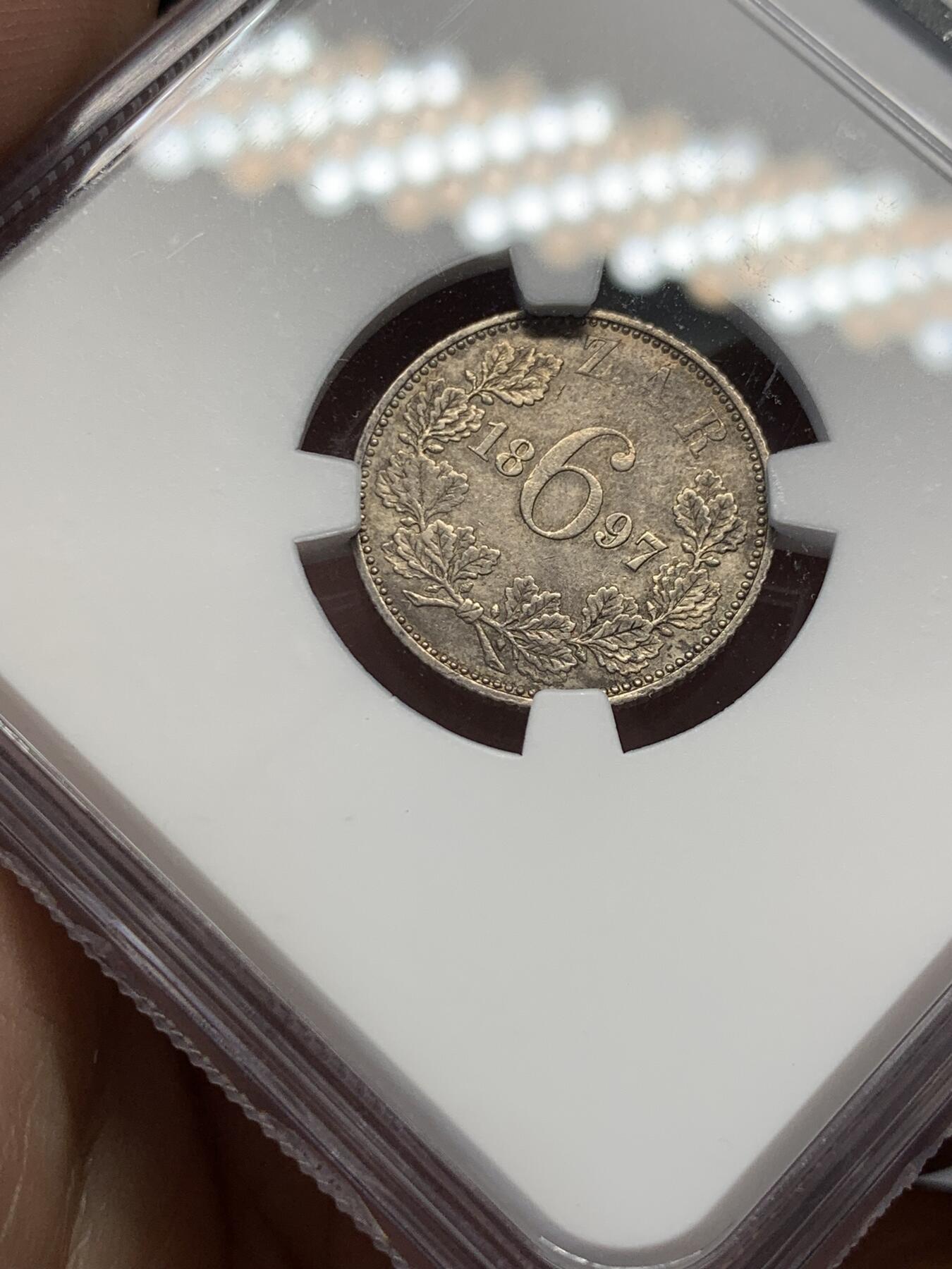 《竞宝斋》第314场 周日，周一，周二  3场连拍 （全场包邮） NGC AU58 德兰士瓦1897年6便士银币，布尔人于南非建立的白人共和国，英布战争前夕铸造，发行仅数个年份。所见多通货，高分少见。凑套必备
