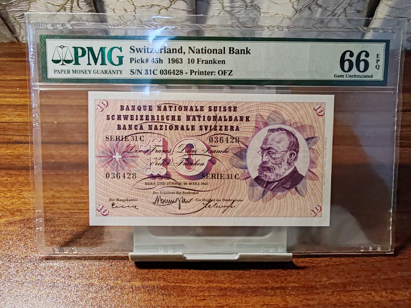 钞品天下  周四场 【31C036428】1963年瑞士10法郎  PMG 66E  老壳尾8