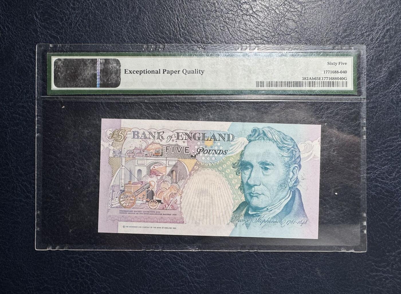 收藏联盟Quantum Auction 第383期拍卖  英国1990年版5镑 PMG65 皇冠版 壳子有磨损