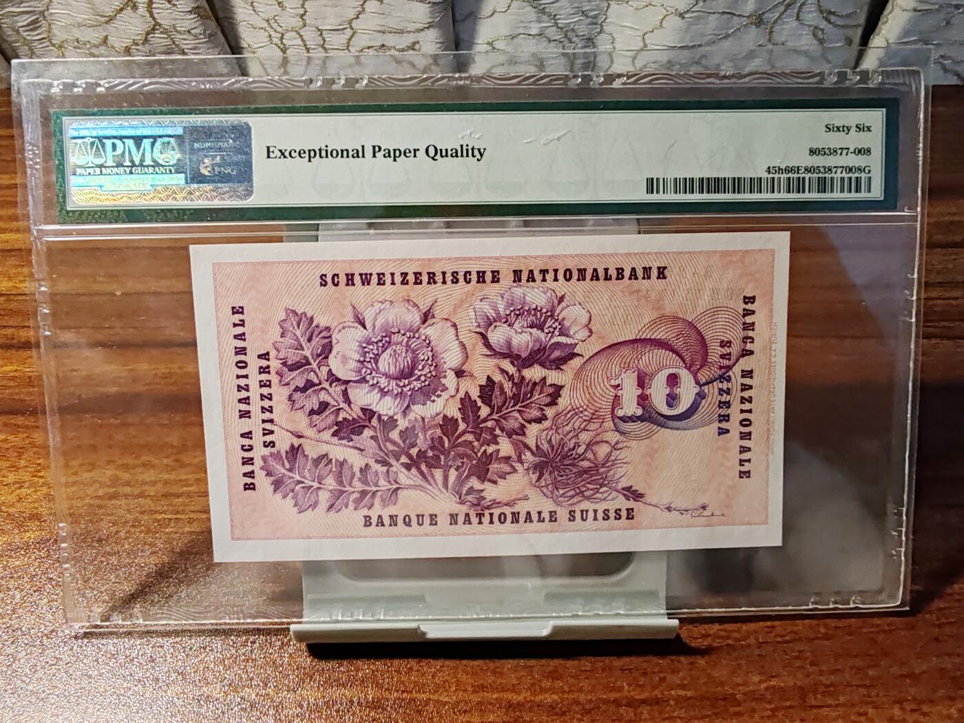 钞品天下  周四场 【31C036428】1963年瑞士10法郎  PMG 66E  老壳尾8