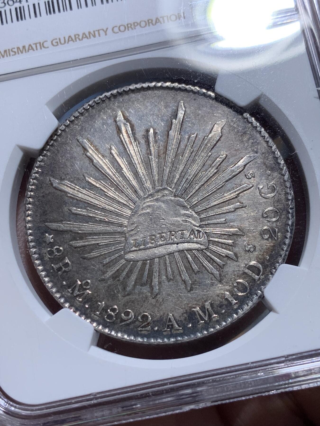 《竞宝斋》第317场 周日，周一 2场连拍 （全场包邮） NGC MS61 墨西哥 1892年 8瑞尔 鹰洋 银币 Mo厂 带黑彩 原光未使用状态