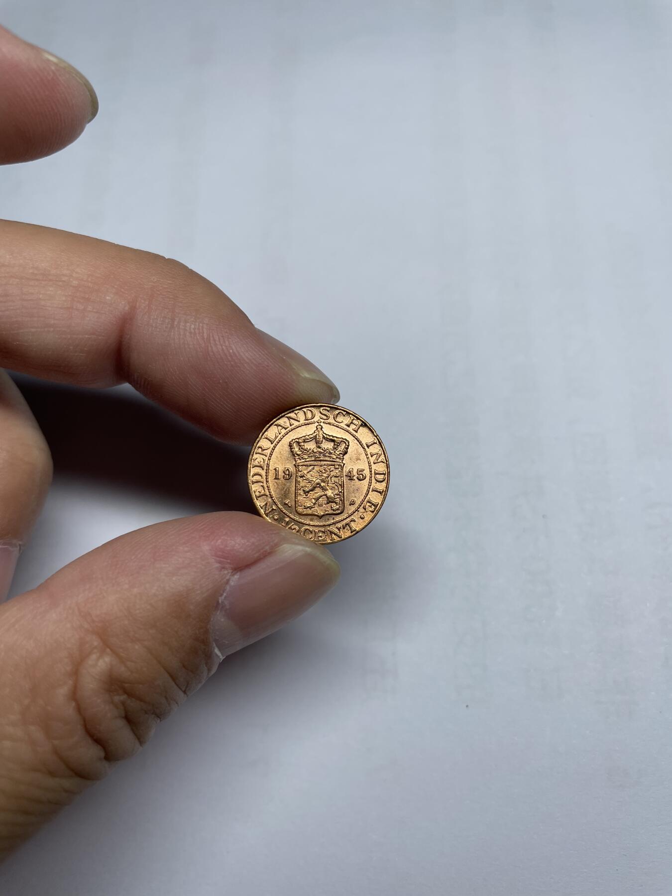 每日一拍，2024年集古藏今外币拍卖第十六期-第4场—（总第154拍），可以寄存60天，满160元包邮。 1945年原光荷属东印度1/2分