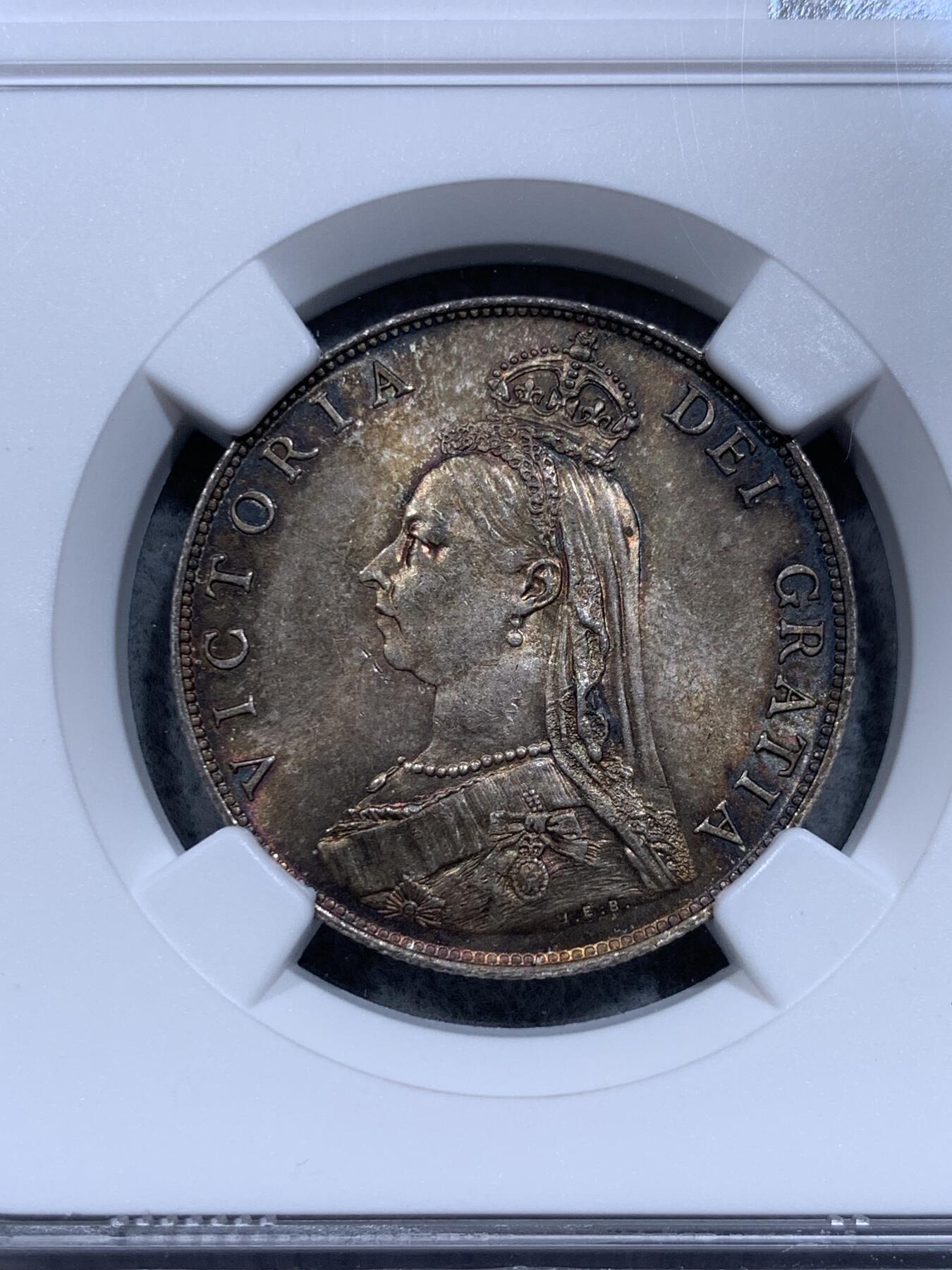 《竞宝斋》第318场 周日，周一 2场连拍 （全场包邮） NGC MS64 1887维多利亚高冠弗洛林银币，顶级酱彩均匀包浆，收藏级别的品相，一步到位！