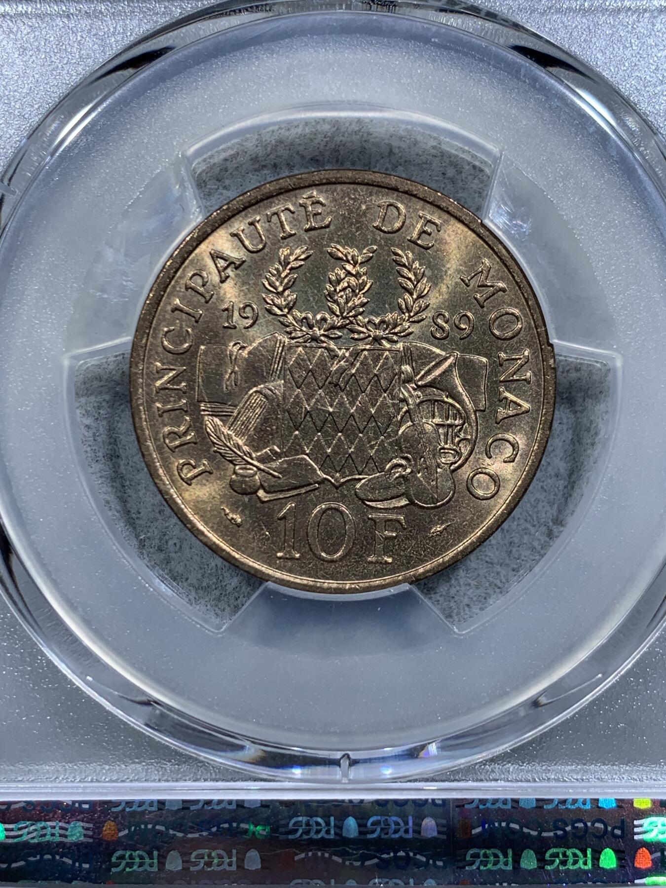 《竞宝斋》第318场 周日，周一 2场连拍 （全场包邮） PCGS MS67 冠军分！1989 摩纳哥 10法郎 皮埃尔王子逝世25周年纪念 属于摩纳哥所有纪念币里第二少见的品种