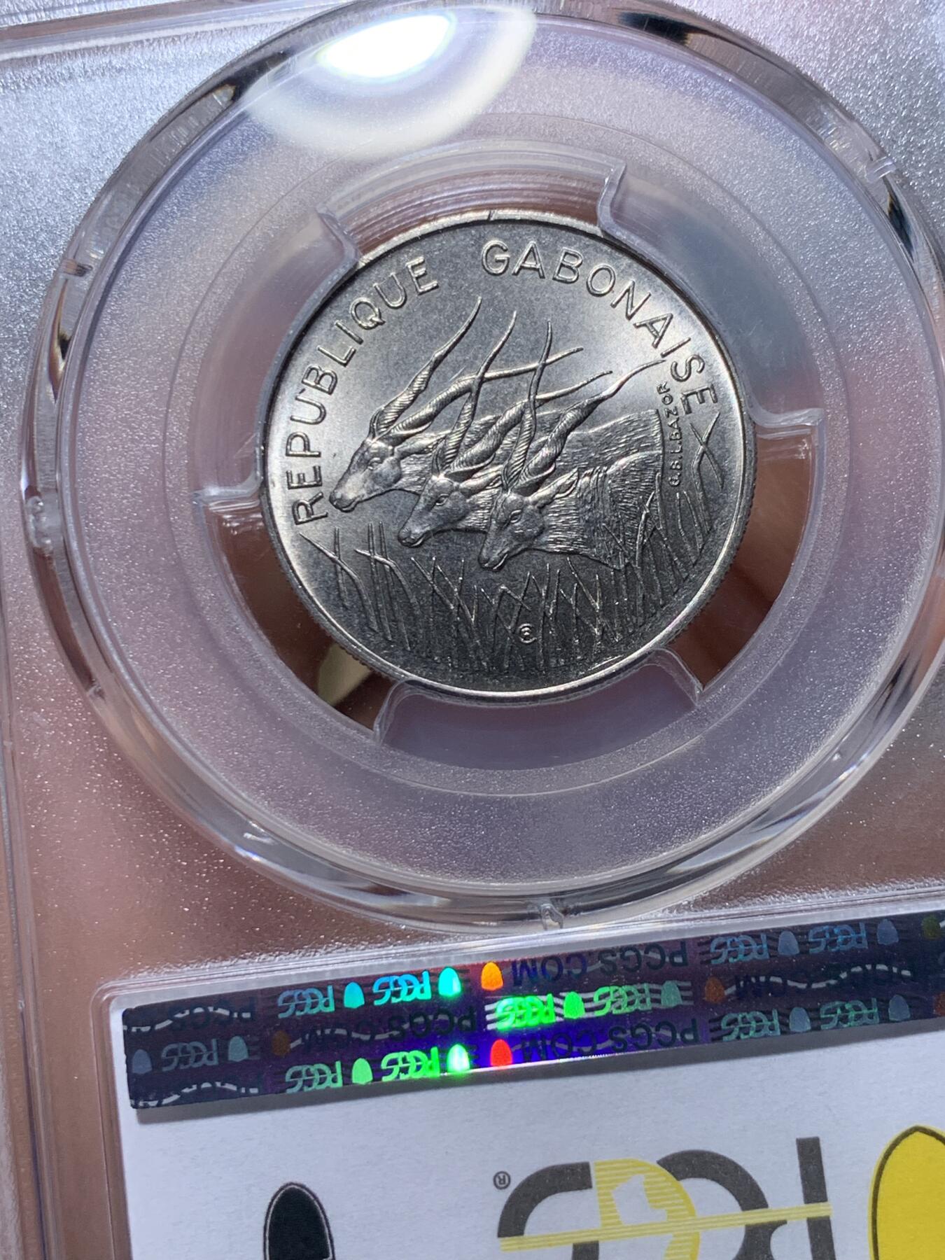 《竞宝斋》第318场 周日，周一 2场连拍 （全场包邮） PCGS MS67 冠军分！ 1971 加蓬 100法郎 加蓬极为少见 属于爱糟蹋币的非洲好兄弟 原光币基本都被糟蹋了 67这样的高分可遇不可求