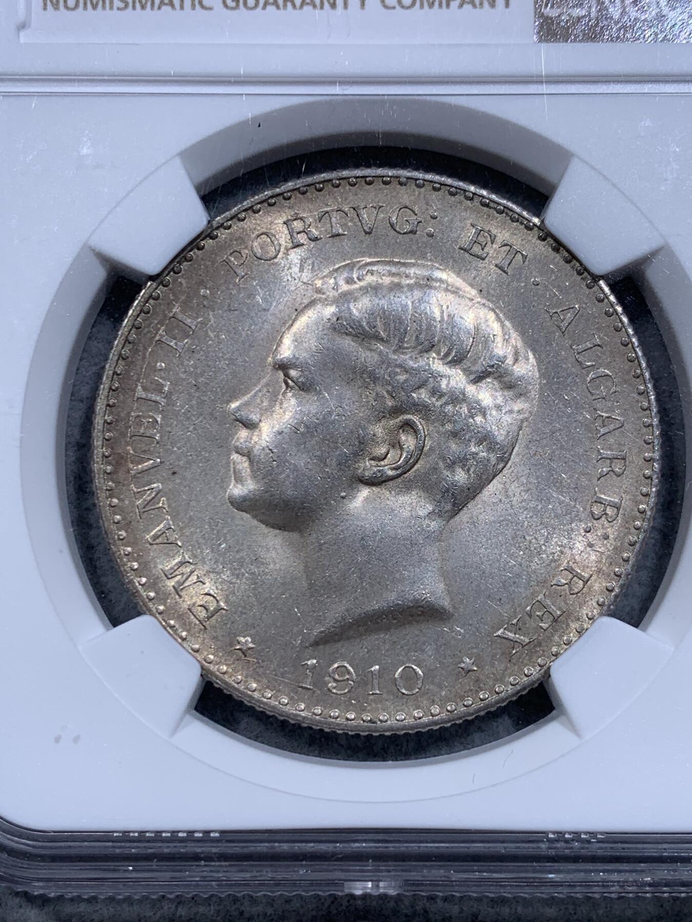 《竞宝斋》第318场 周日，周一 2场连拍 （全场包邮） NGC MS61 葡萄牙王国1910年半岛战争1000reis大银币。葡萄牙王国最后的大银，关门币，之后就是共和国时期了。低评，62状态。金色包浆