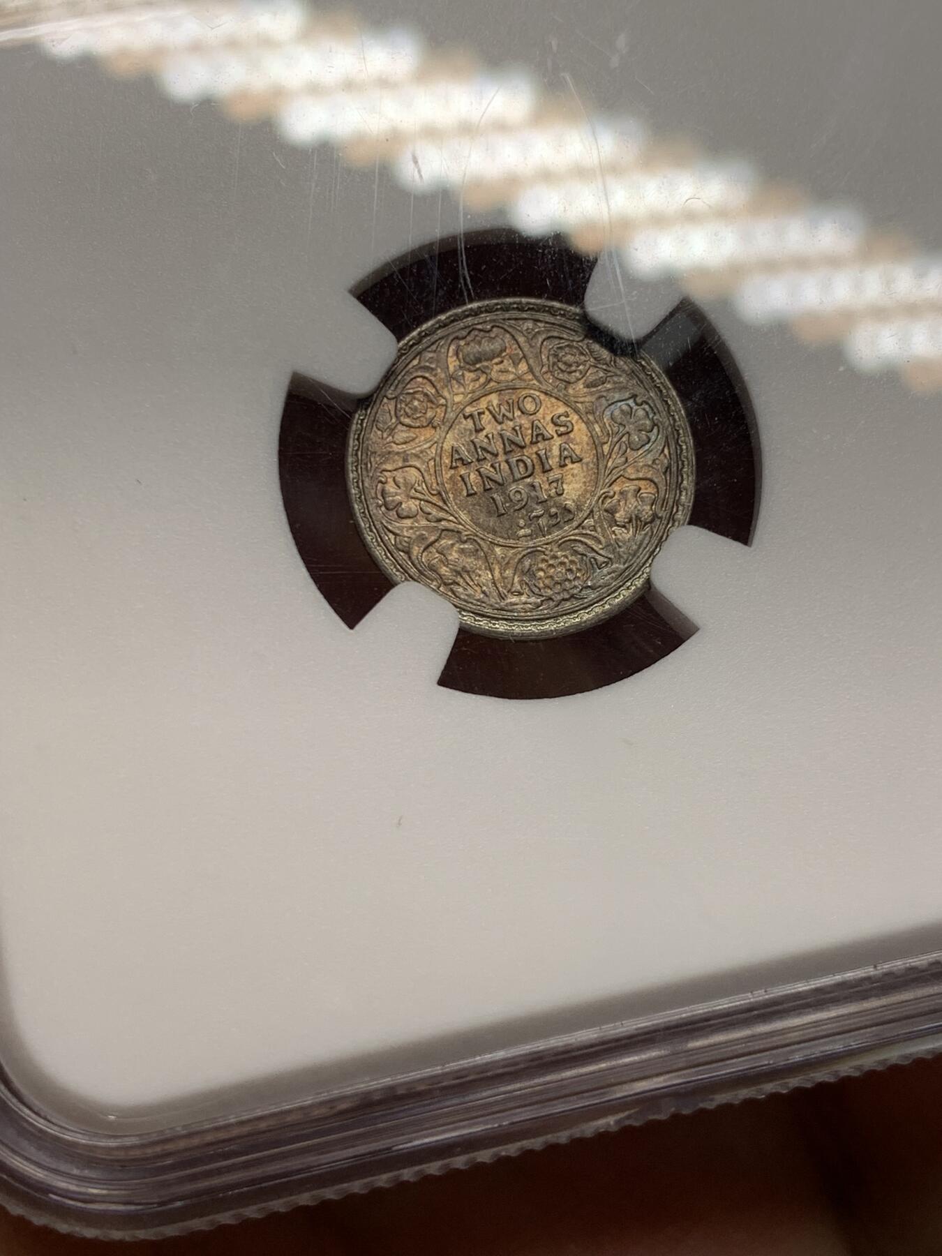 《竞宝斋》第318场 周日，周一 2场连拍 （全场包邮） NGC MS63 英属印度 1917年 乔治五世 2安娜 银币 背面五彩 正面淡五彩 包浆