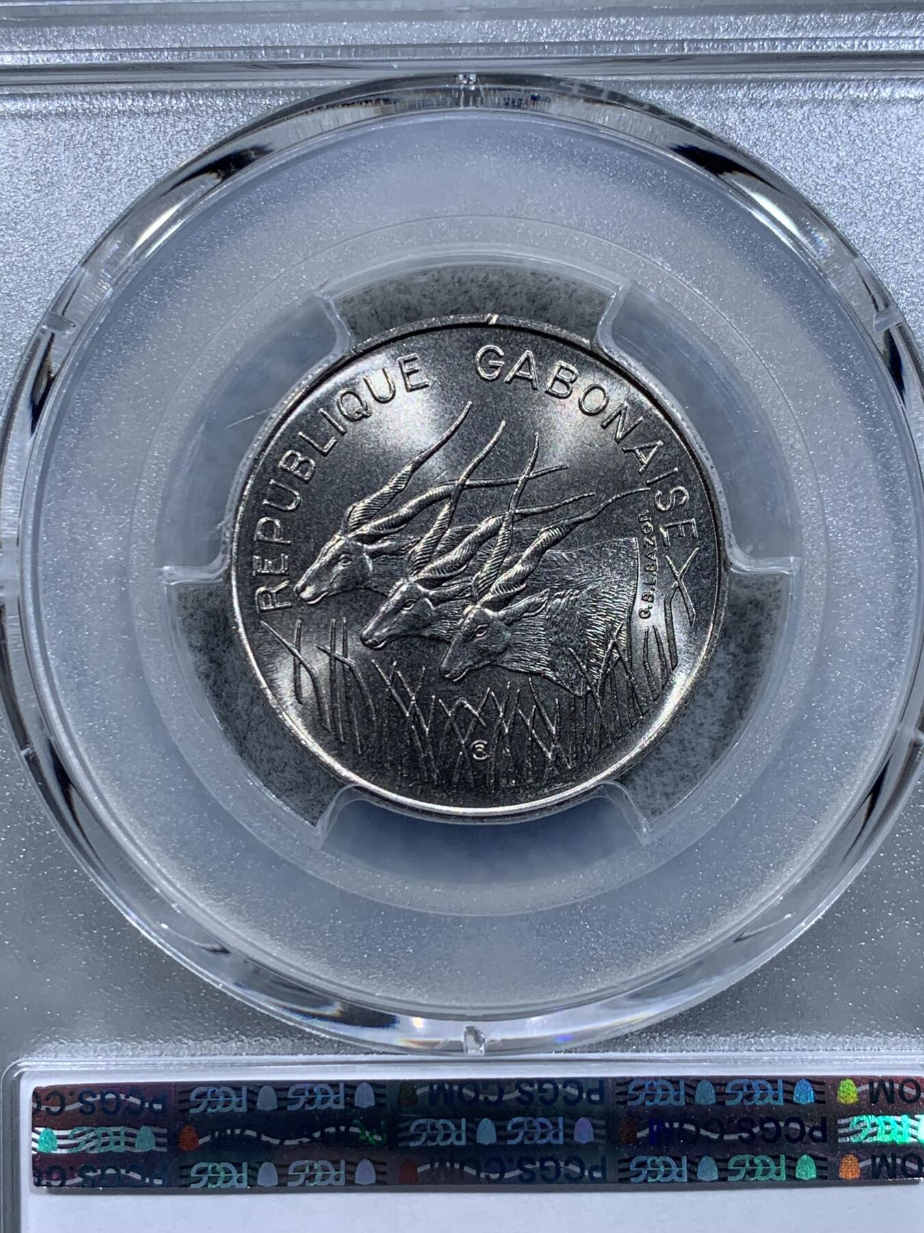 《竞宝斋》第318场 周日，周一 2场连拍 （全场包邮） PCGS MS67 冠军分！ 1971 加蓬 100法郎 加蓬极为少见 属于爱糟蹋币的非洲好兄弟 原光币基本都被糟蹋了 67这样的高分可遇不可求