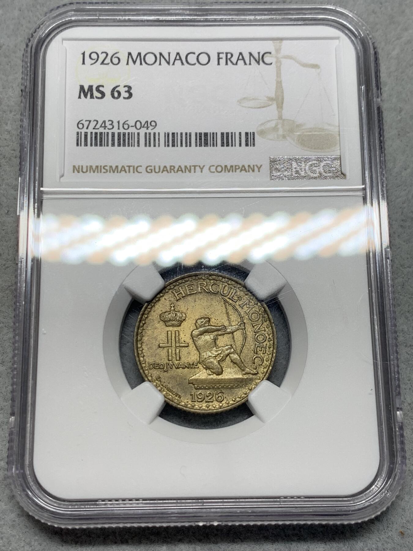《竞宝斋》第318场 周日，周一 2场连拍 （全场包邮） NGC MS63 1926 摩纳哥1法郎黄铜币 两面转光 略带包浆 味道很正的一枚 射击图案经典