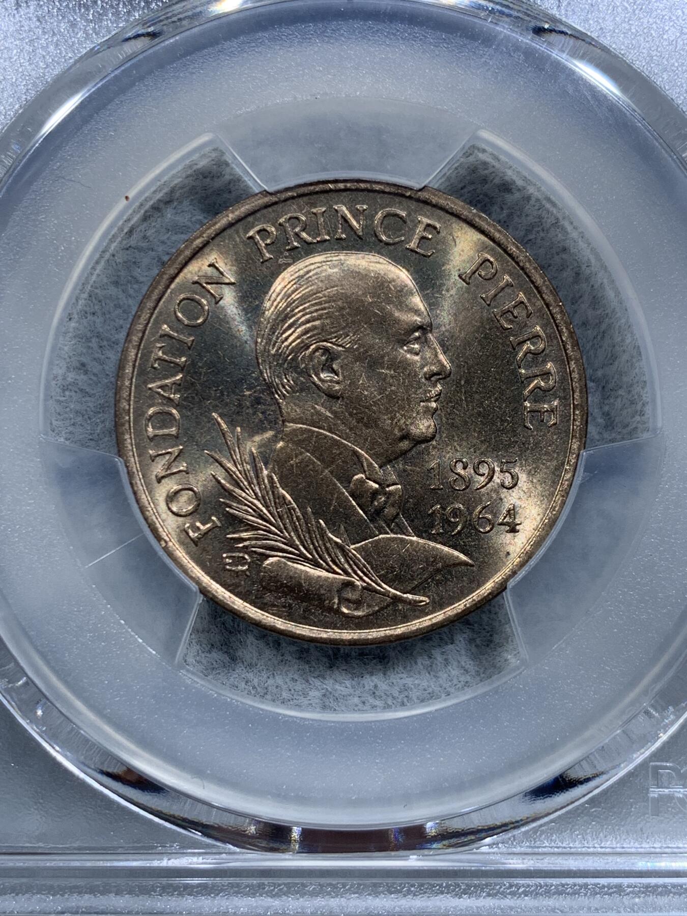 《竞宝斋》第318场 周日，周一 2场连拍 （全场包邮） PCGS MS67 冠军分！1989 摩纳哥 10法郎 皮埃尔王子逝世25周年纪念 属于摩纳哥所有纪念币里第二少见的品种