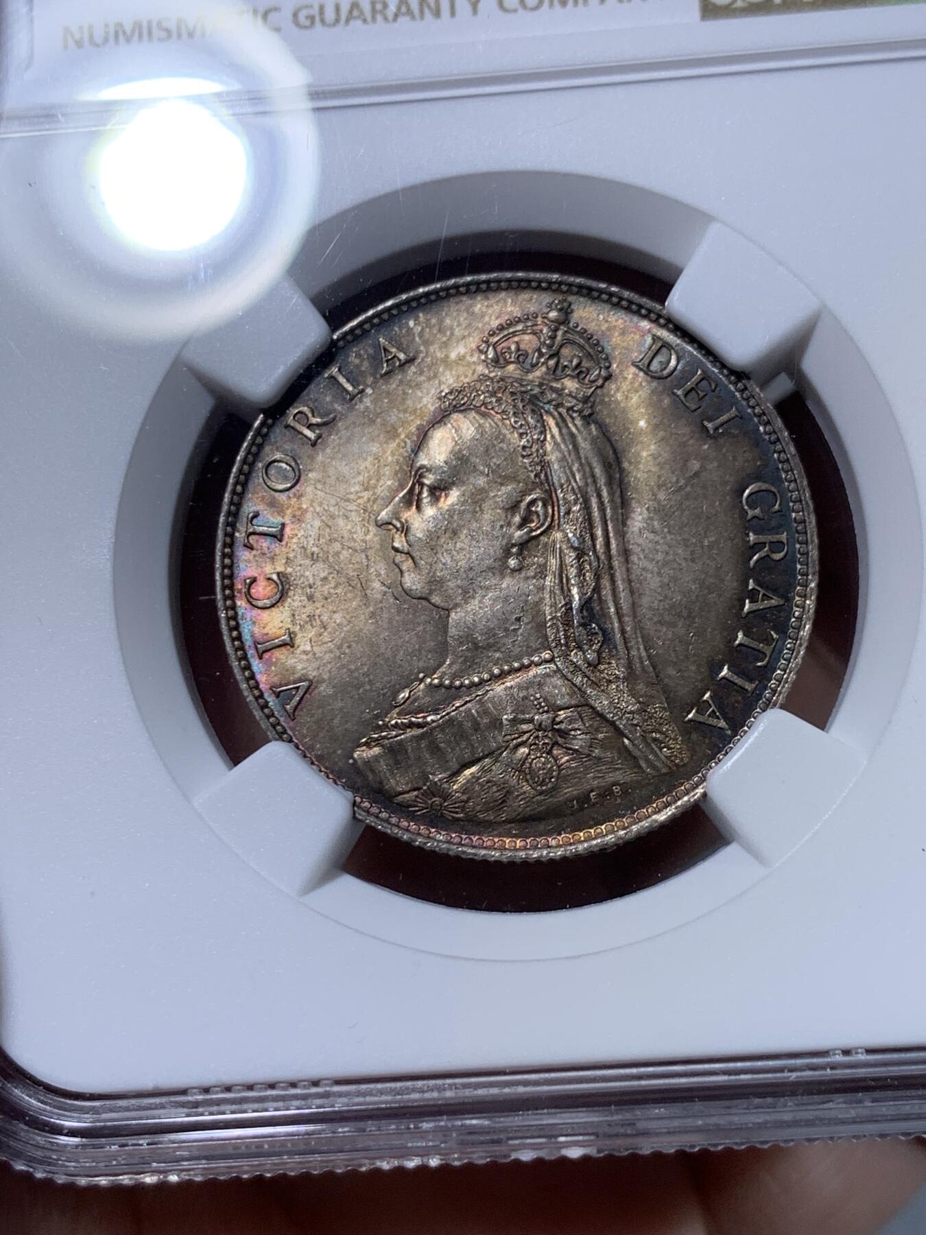 《竞宝斋》第318场 周日，周一 2场连拍 （全场包邮） NGC MS64 1887维多利亚高冠弗洛林银币，顶级酱彩均匀包浆，收藏级别的品相，一步到位！