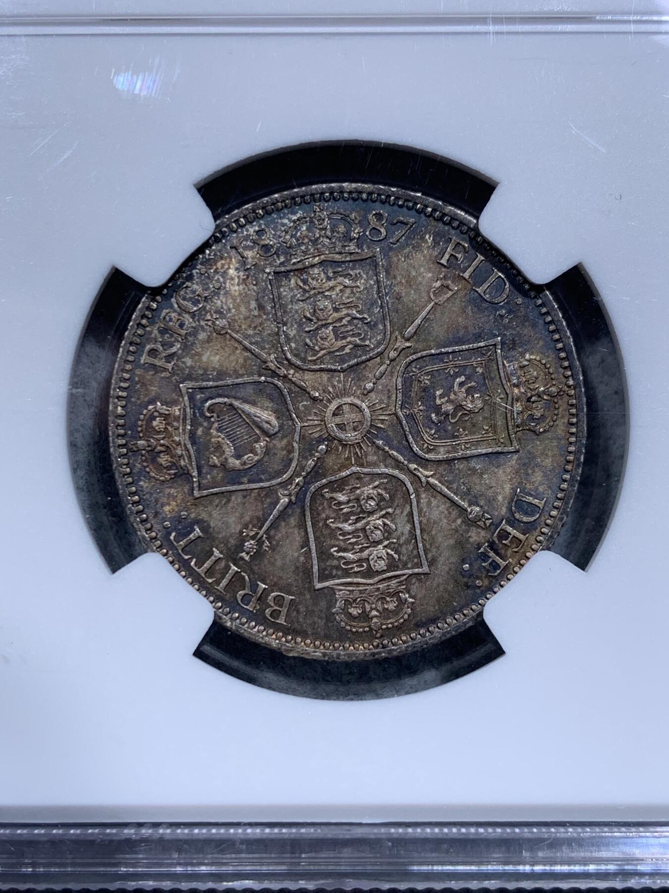 《竞宝斋》第318场 周日，周一 2场连拍 （全场包邮） NGC MS64 1887维多利亚高冠弗洛林银币，顶级酱彩均匀包浆，收藏级别的品相，一步到位！