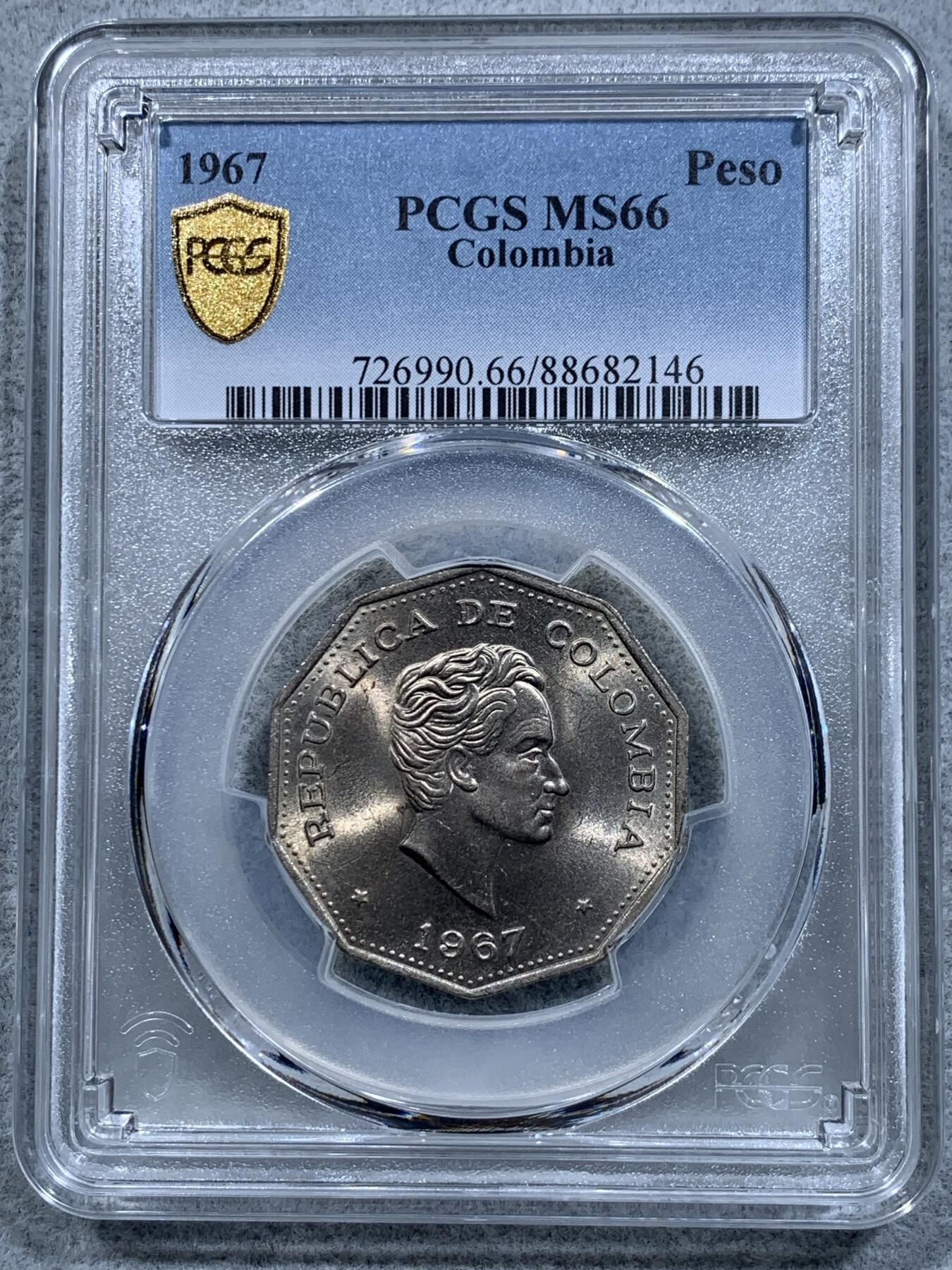 《竞宝斋》第318场 周日，周一 2场连拍 （全场包邮） PCGS MS66 哥伦比亚1967年1比索，少见品种！西蒙·玻利瓦尔多边形铜镍币，唯一的冠军分！