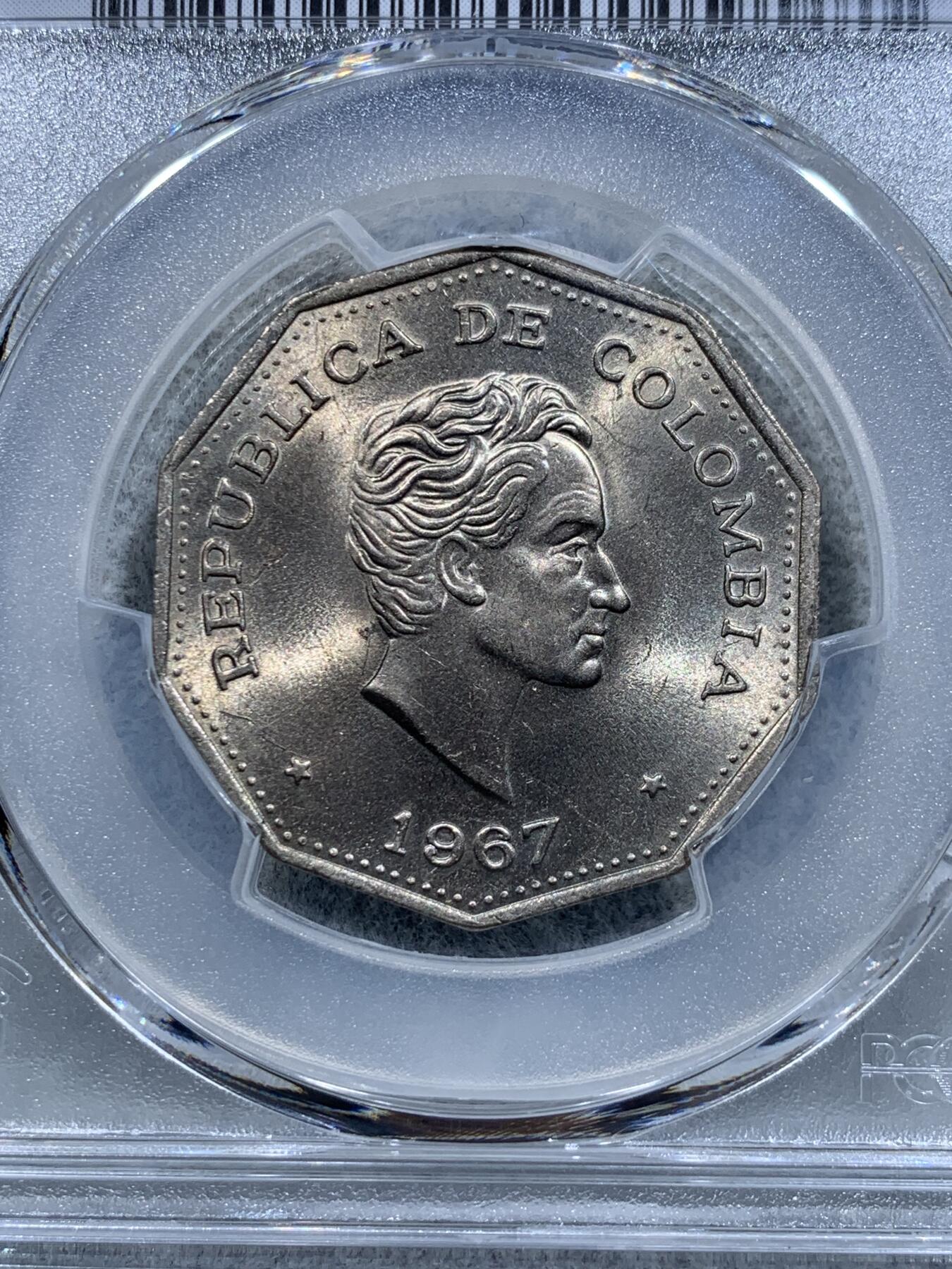 《竞宝斋》第318场 周日，周一 2场连拍 （全场包邮） PCGS MS66 哥伦比亚1967年1比索，少见品种！西蒙·玻利瓦尔多边形铜镍币，唯一的冠军分！