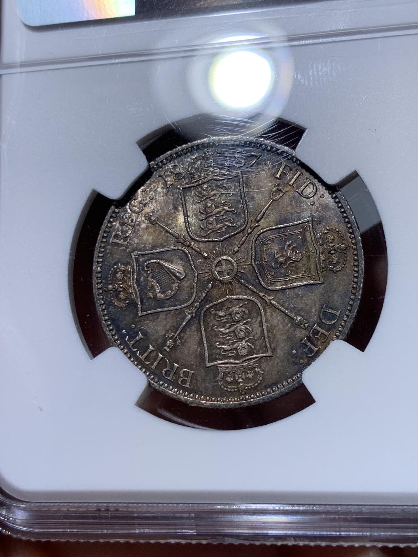 《竞宝斋》第318场 周日，周一 2场连拍 （全场包邮） NGC MS64 1887维多利亚高冠弗洛林银币，顶级酱彩均匀包浆，收藏级别的品相，一步到位！