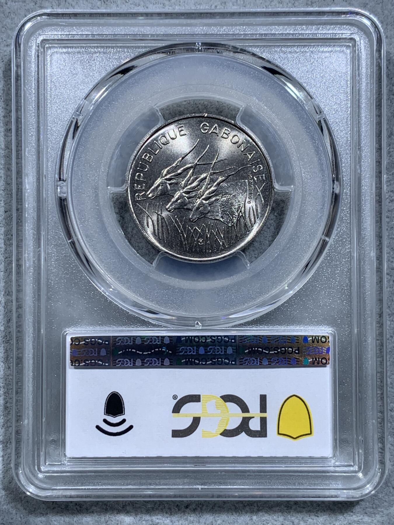 《竞宝斋》第318场 周日，周一 2场连拍 （全场包邮） PCGS MS67 冠军分！ 1971 加蓬 100法郎 加蓬极为少见 属于爱糟蹋币的非洲好兄弟 原光币基本都被糟蹋了 67这样的高分可遇不可求