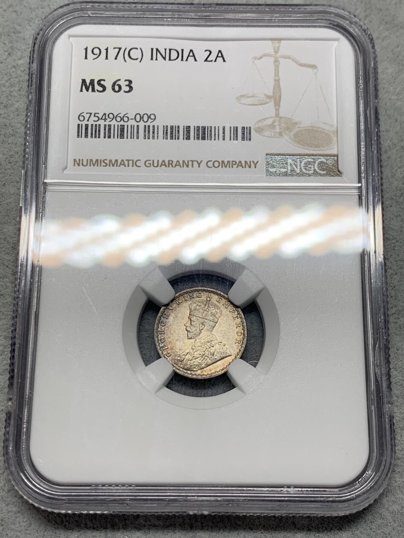 《竞宝斋》第318场 周日，周一 2场连拍 （全场包邮） NGC MS63 英属印度 1917年 乔治五世 2安娜 银币 背面五彩 正面淡五彩 包浆