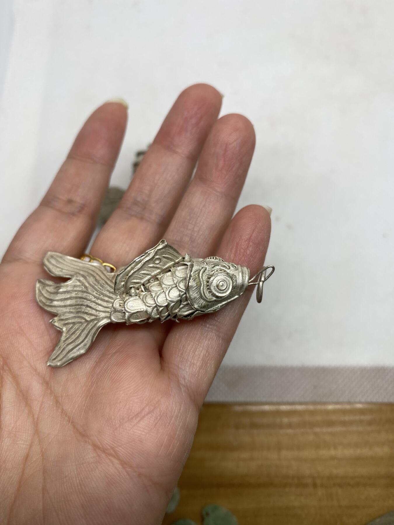 老铜鎏银鱼一对，尺寸6.4厘米，可以活动，品相如图，150包快递