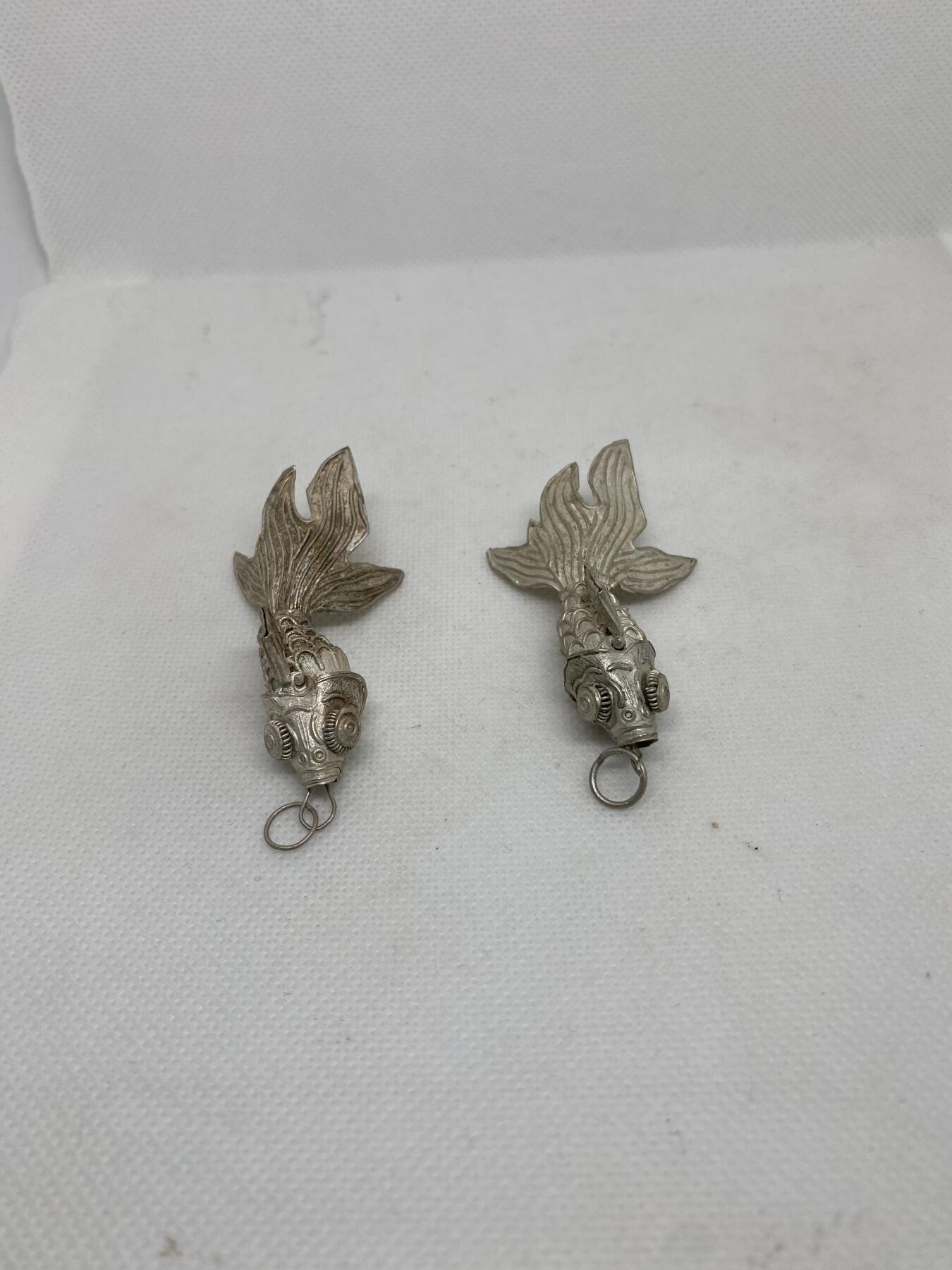 老铜鎏银鱼一对，尺寸6.4厘米，可以活动，品相如图，150包快递