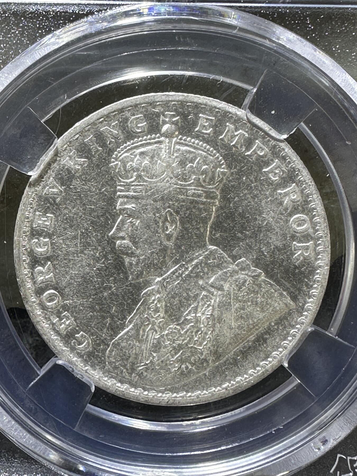 1919年。英属印度乔治五世一卢比银币一枚，