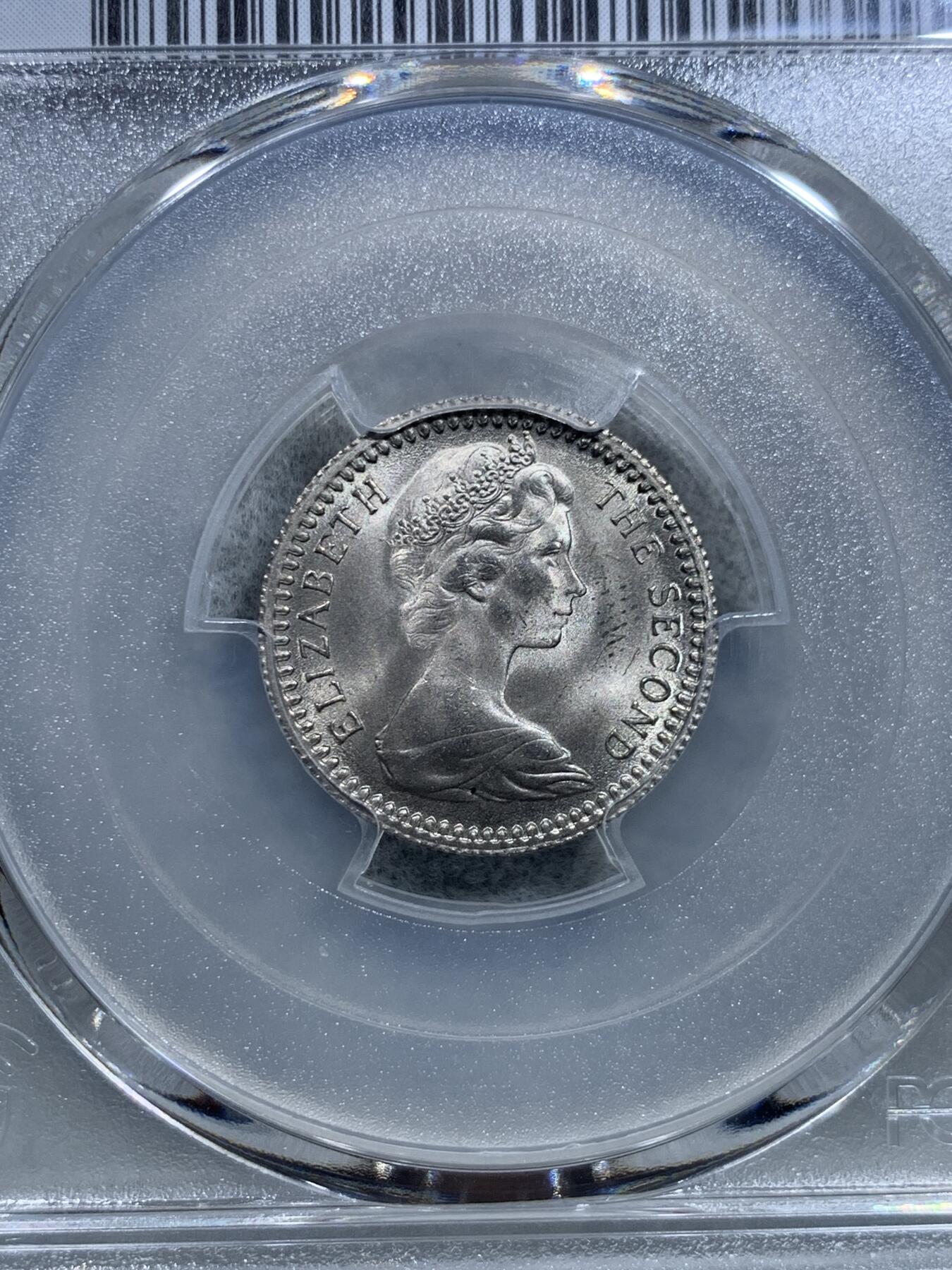 《竞宝斋》第319场 周日，周一，周二  3场连拍 （全场包邮） PCGS MS65 亚军分！1964 罗德西亚 6便士=5分 著名的双面值币 这个品种普遍划伤很多 而这枚两面爆光 可遇不可求