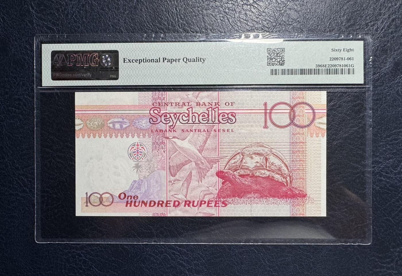 收藏联盟Quantum Auction 第385期拍卖  塞舌尔1998年100卢比首发AA冠 PMG68 大陆龟