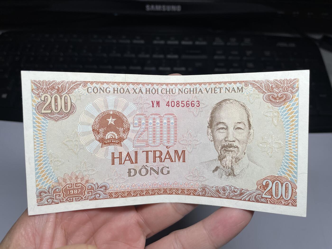 2024年集古藏今外币拍卖第十六期-第10场—（总第160拍-纸币专场），本期拍完结算一次，发货时间2-3天，休息几天后继续新的一期拍卖。 1987年越南200盾
