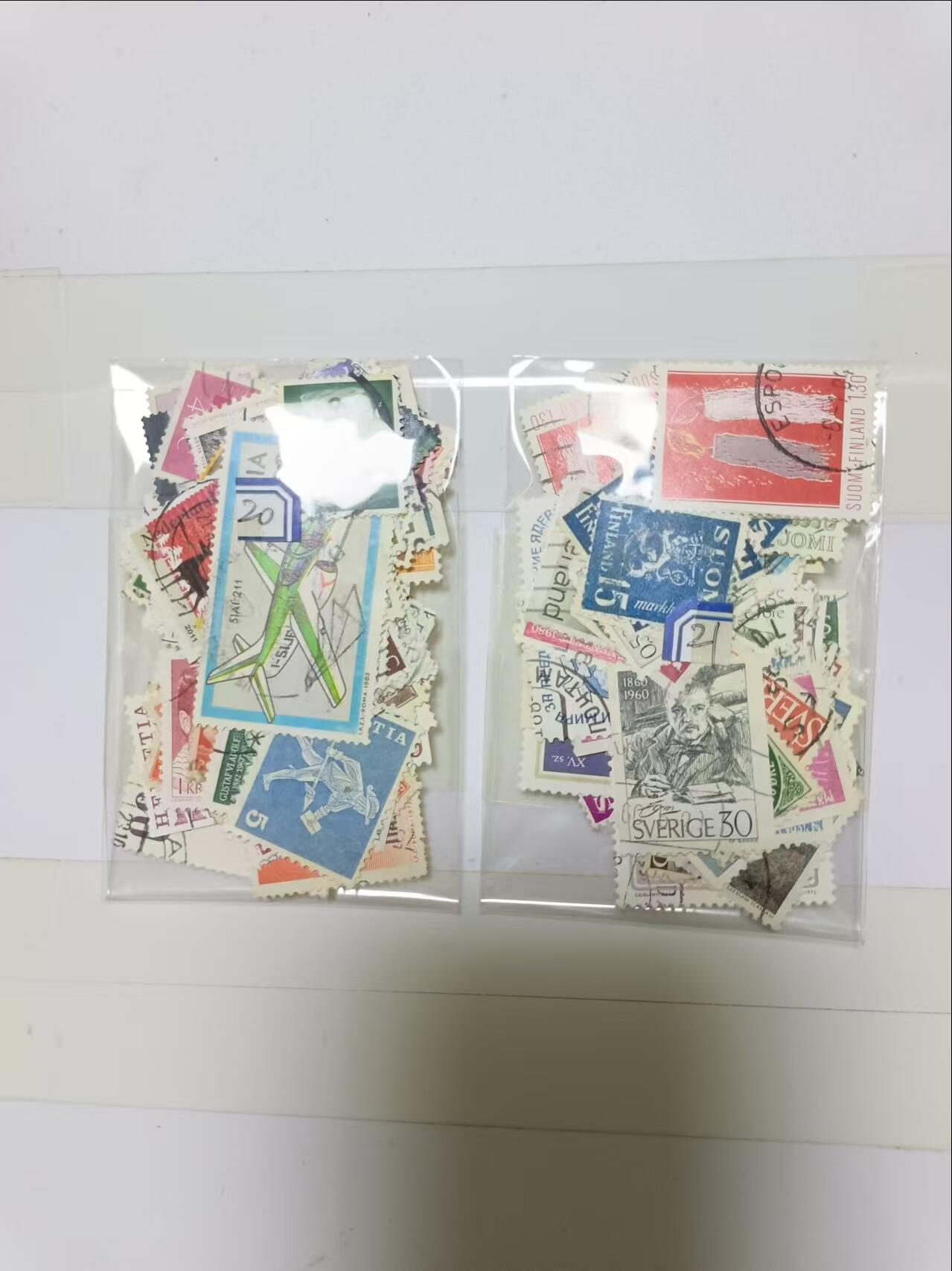 【20241024】邮票和纸质印刷品第3场 2袋邮票，盖销票和信销票，有重复，编号20和21