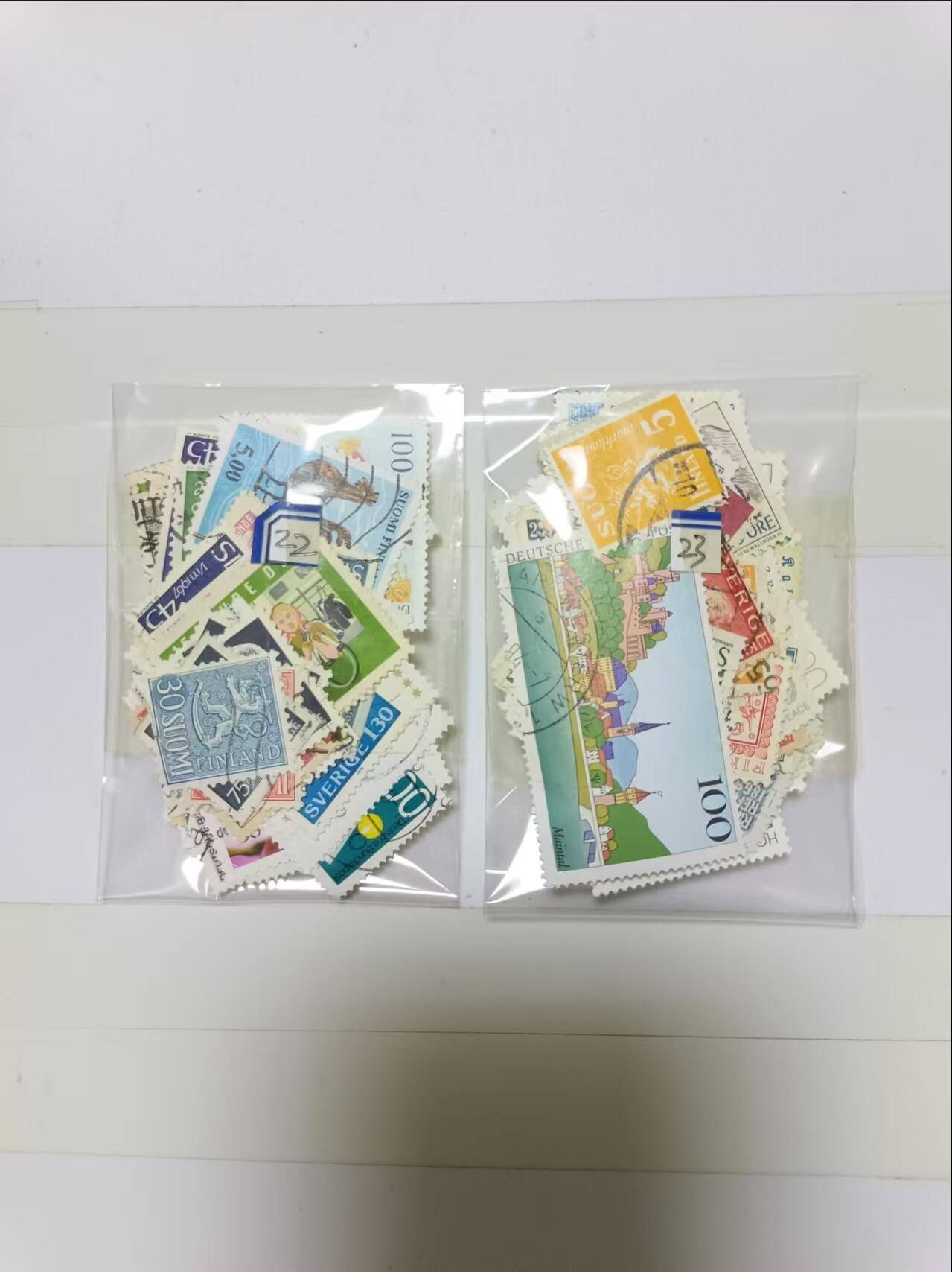 【20241024】邮票和纸质印刷品第3场 2袋邮票，盖销票和信销票，有重复，编号22和23
