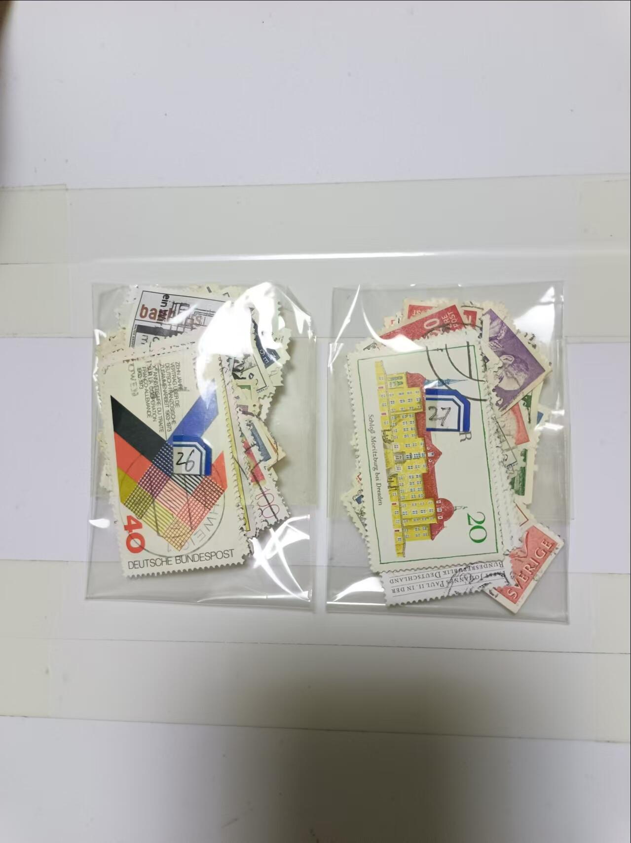 【20241024】邮票和纸质印刷品第3场 2袋邮票，盖销票和信销票，有重复，编号26和27