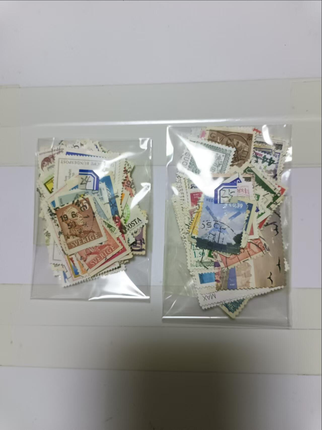【20241024】邮票和纸质印刷品第3场 2袋邮票，盖销票和信销票，有重复，编号24和25